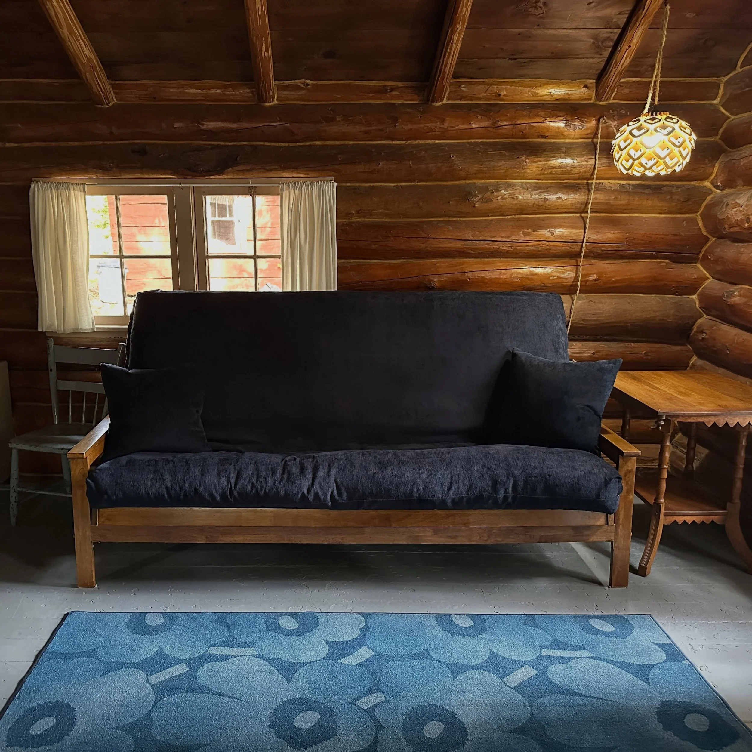 A perfect place to relax in the Kaksi (No. 2) cabin. manninenscabins.com #kaksicabin #otterlakelife #manninenscabins