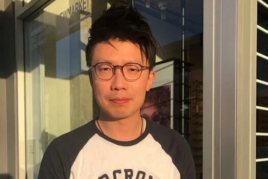 Hugh Shi wearing Yellows Plus