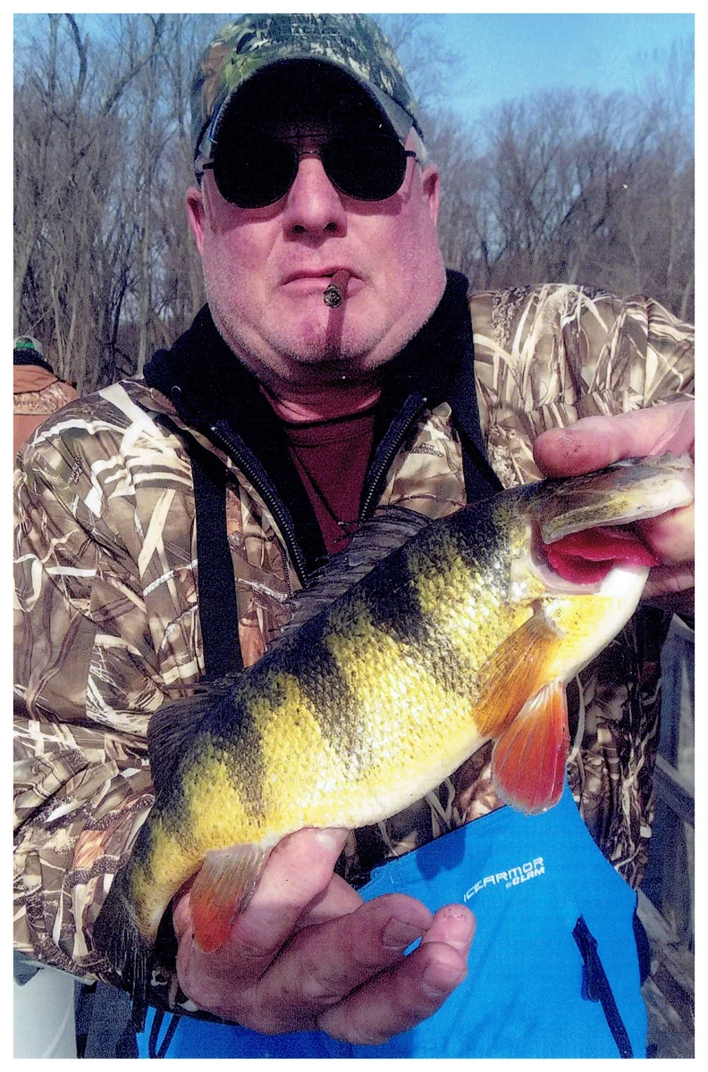 Daniel Kirk; Union Grove, WI - 15 ¼” Perch on the Mississippi River using a nightcrawler