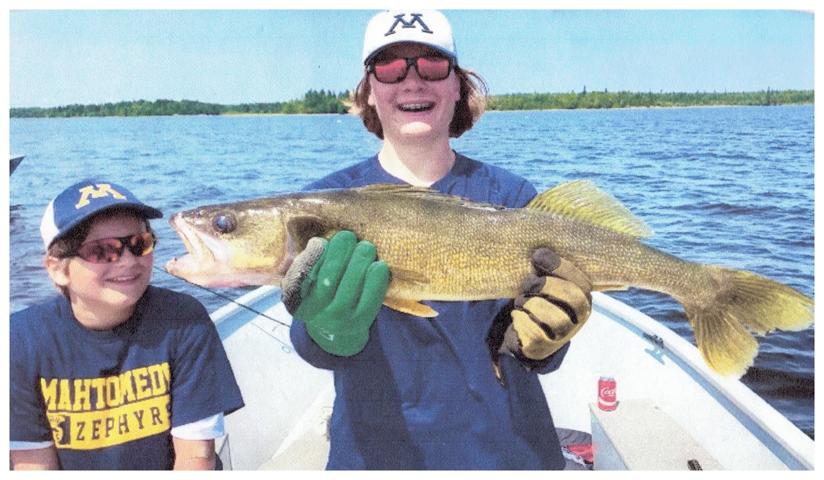 Youth Winner: Hayes Bergren; Mahtomedi, MN - 29” Walleye on Lac Seul Lake using a minnow