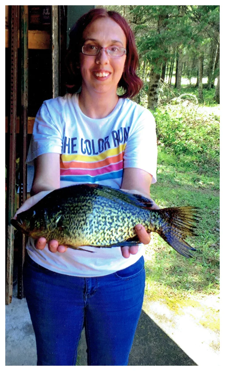 Megan Beck; Fond du Lac, WI - 14” Crappie on Pole Lake using a nightcrawler