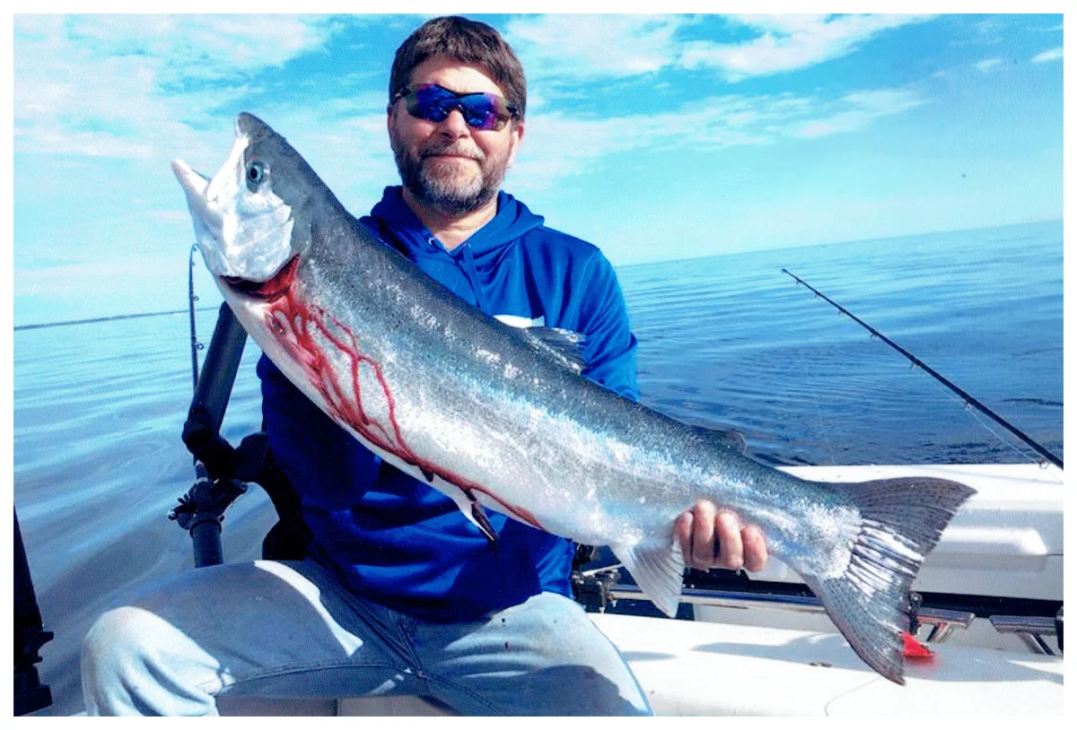 Jason Gaurkee; Delafield, WI - 36” Rainbow Trout on Lake Michigan using a spoon