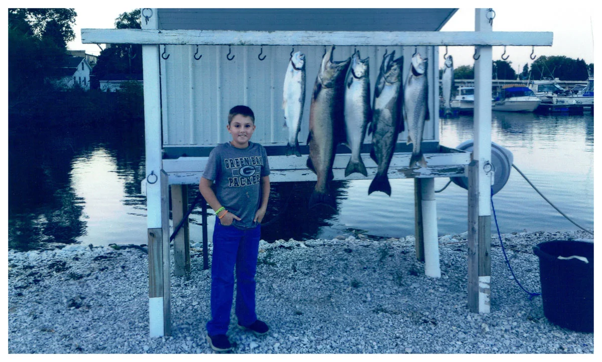 Youth Winner: Brody Freeman; Whitewater, WI - 36” Salmon on Lake Michigan using a artificial lure
