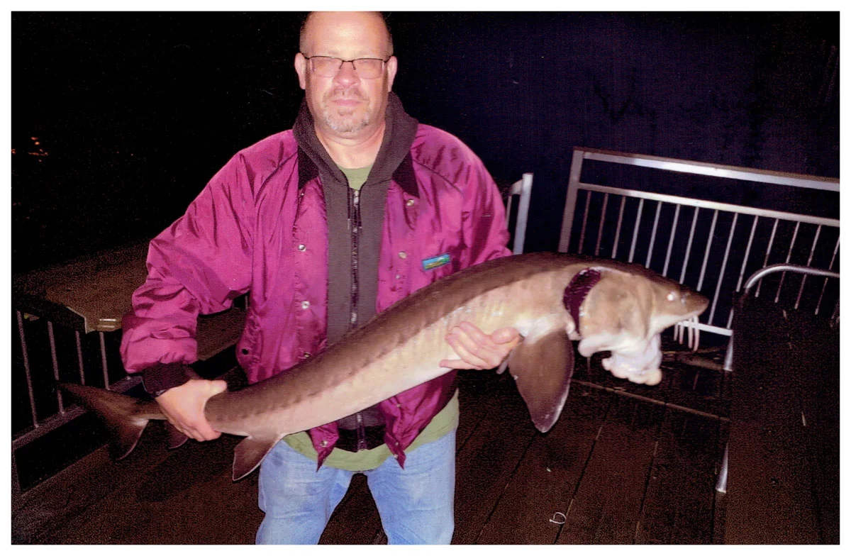 Brian Doe; Racine, WI - 58” Sturgeon on the Wisconsin River using nightcrawlers