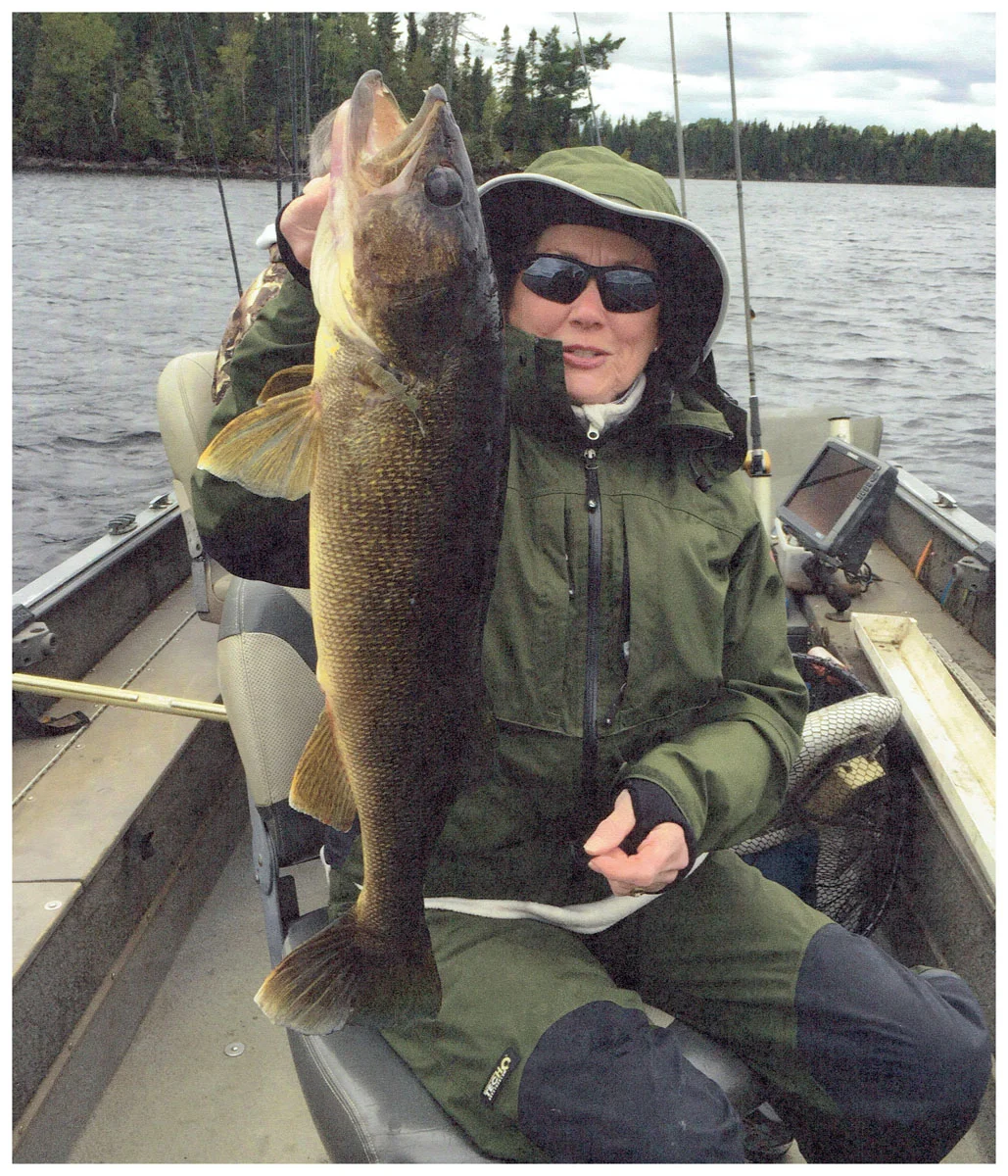 Nancy Simonson; Vadnais Hgts, MN - 30” Walleye on Saganaga Lake using a minnow