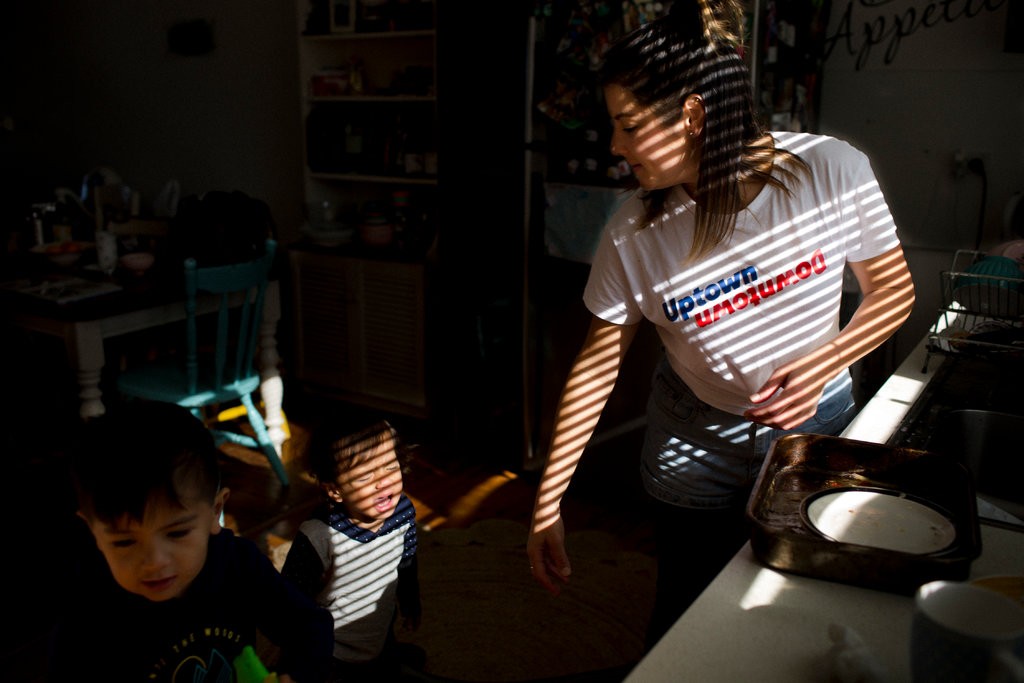 Renay Heng, Mr. Stowers’s partner, preparing to take their sons Isaiah, 3, and Zion, 1, to visit him in the detention center. Credit: David Maurice Smith for The New York Times