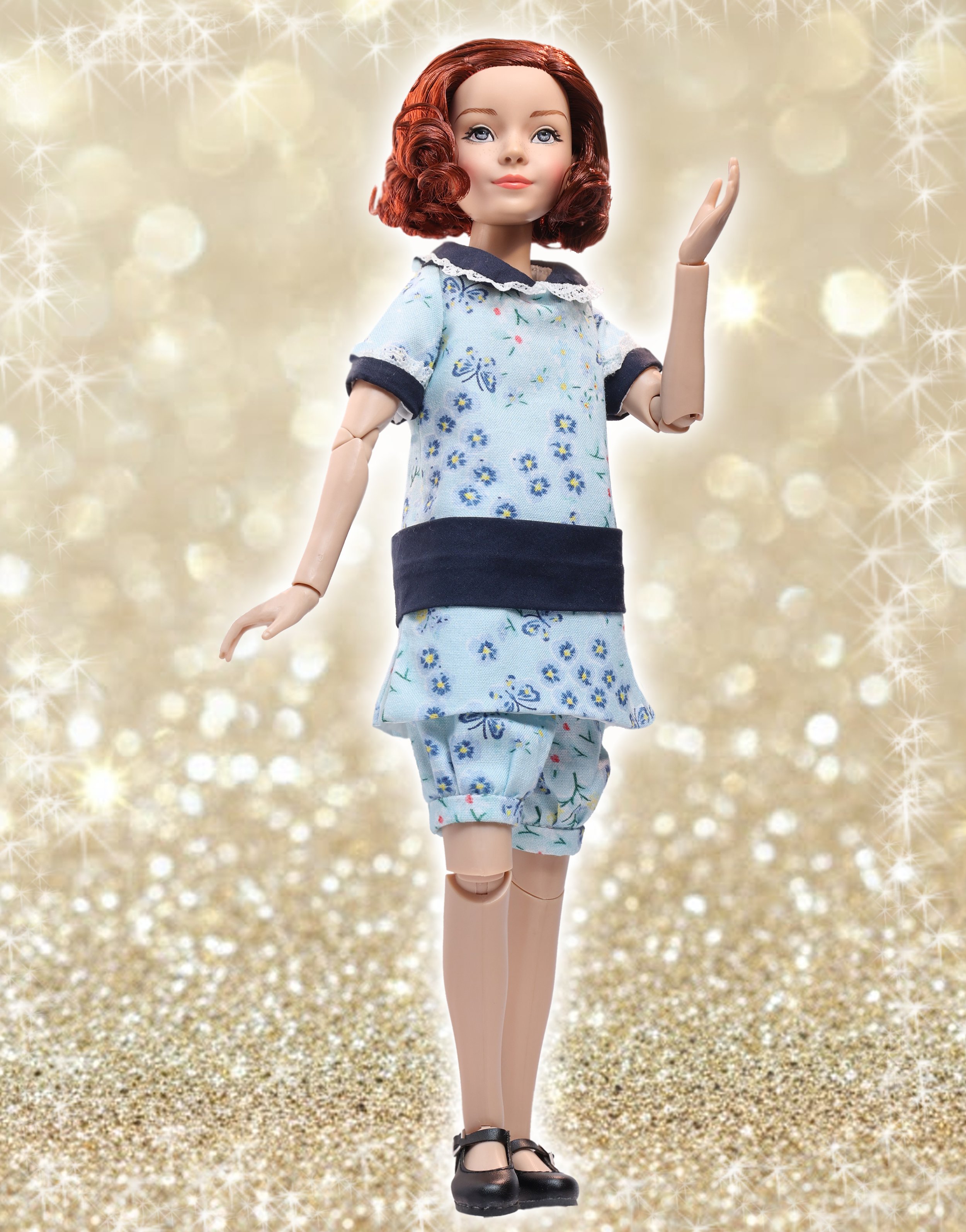 Putting on the Ritz Romper- Glitter Background.jpg