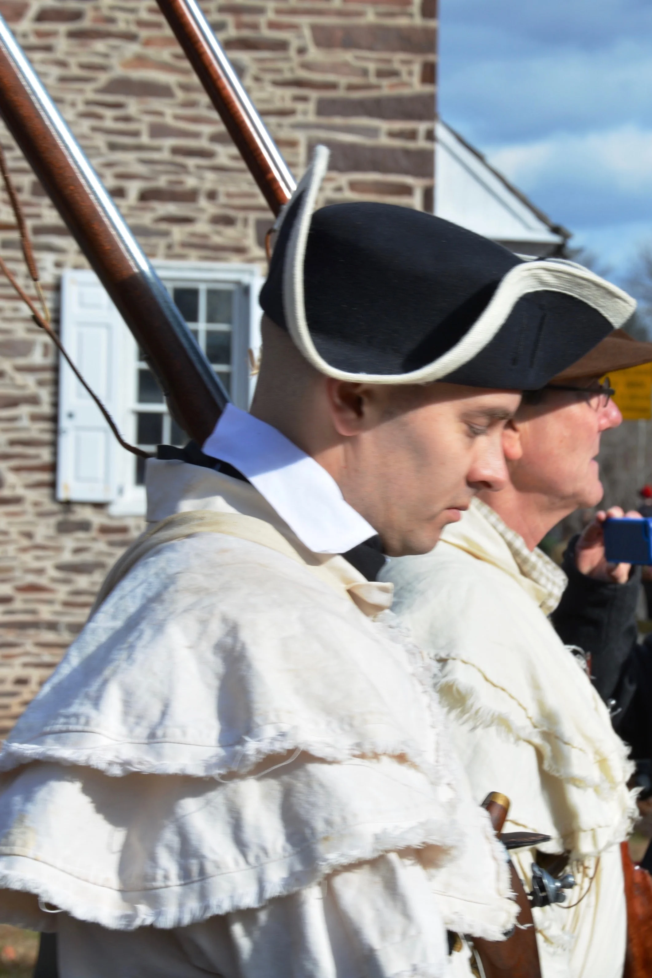 Actors reenact the troops gathering at the river before making the crossing.