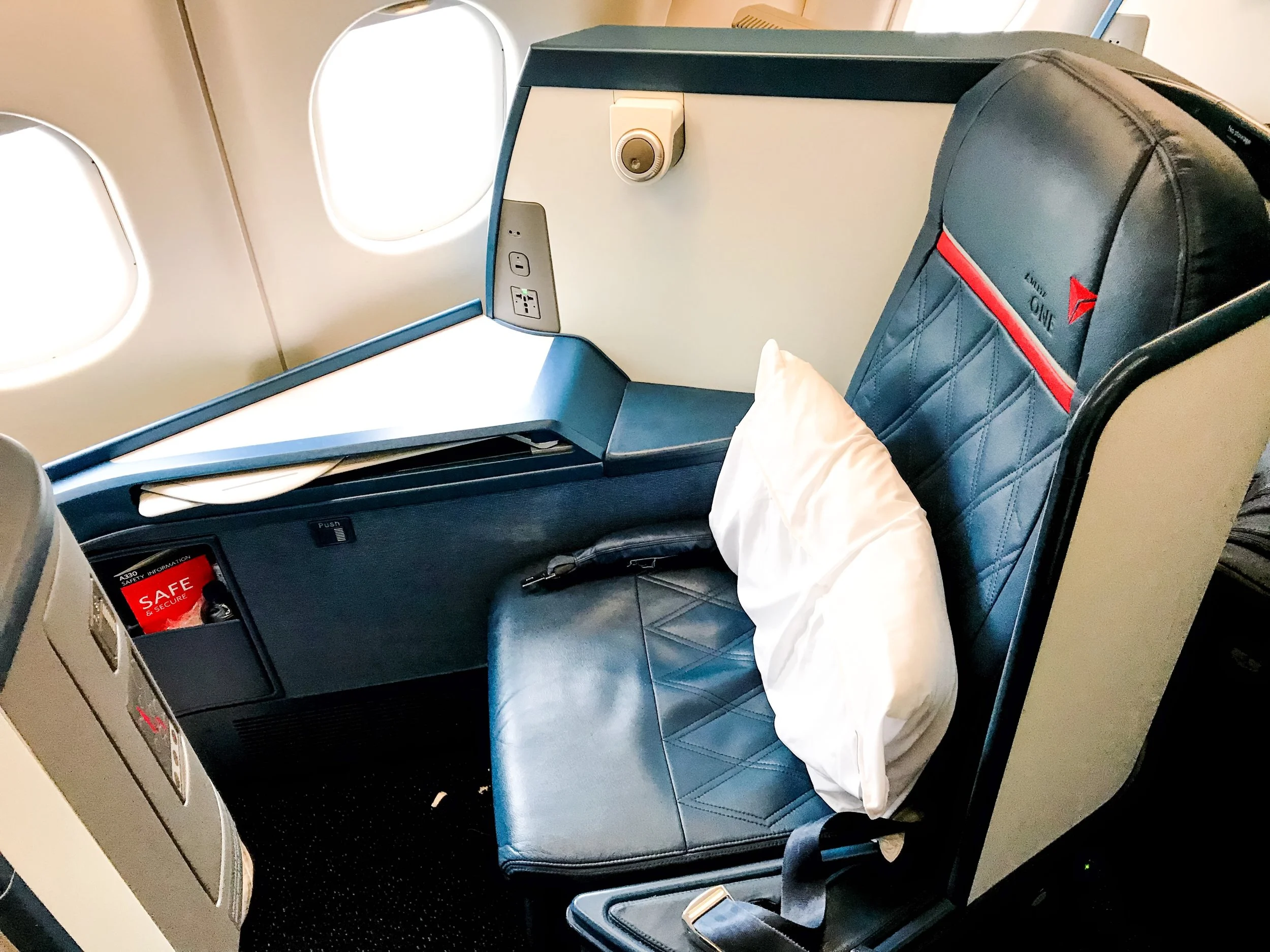 The seats are very comfortable and have ample space to place small personal belongings. That is a frequent complaint about some premium cabins.