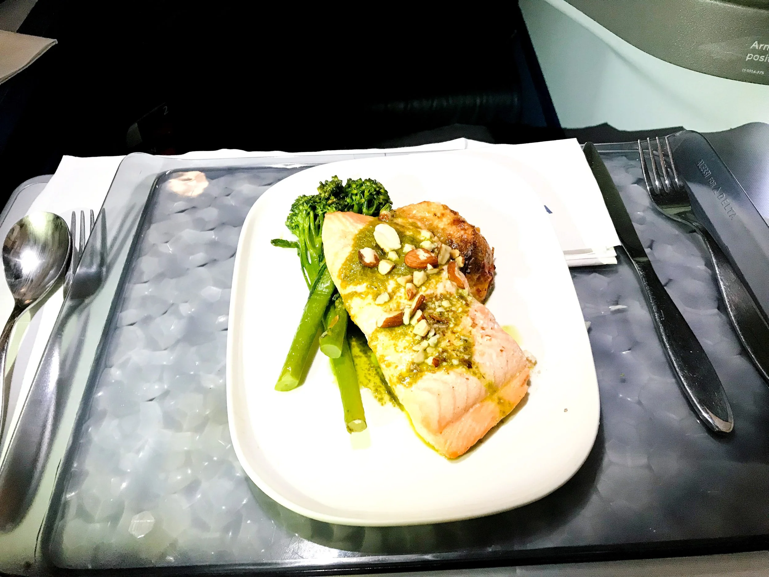 The main course was a salmon filet over a bed of rice and vegetables. The salmon was very moist and not dried out, which is a common occurrence on flights.
