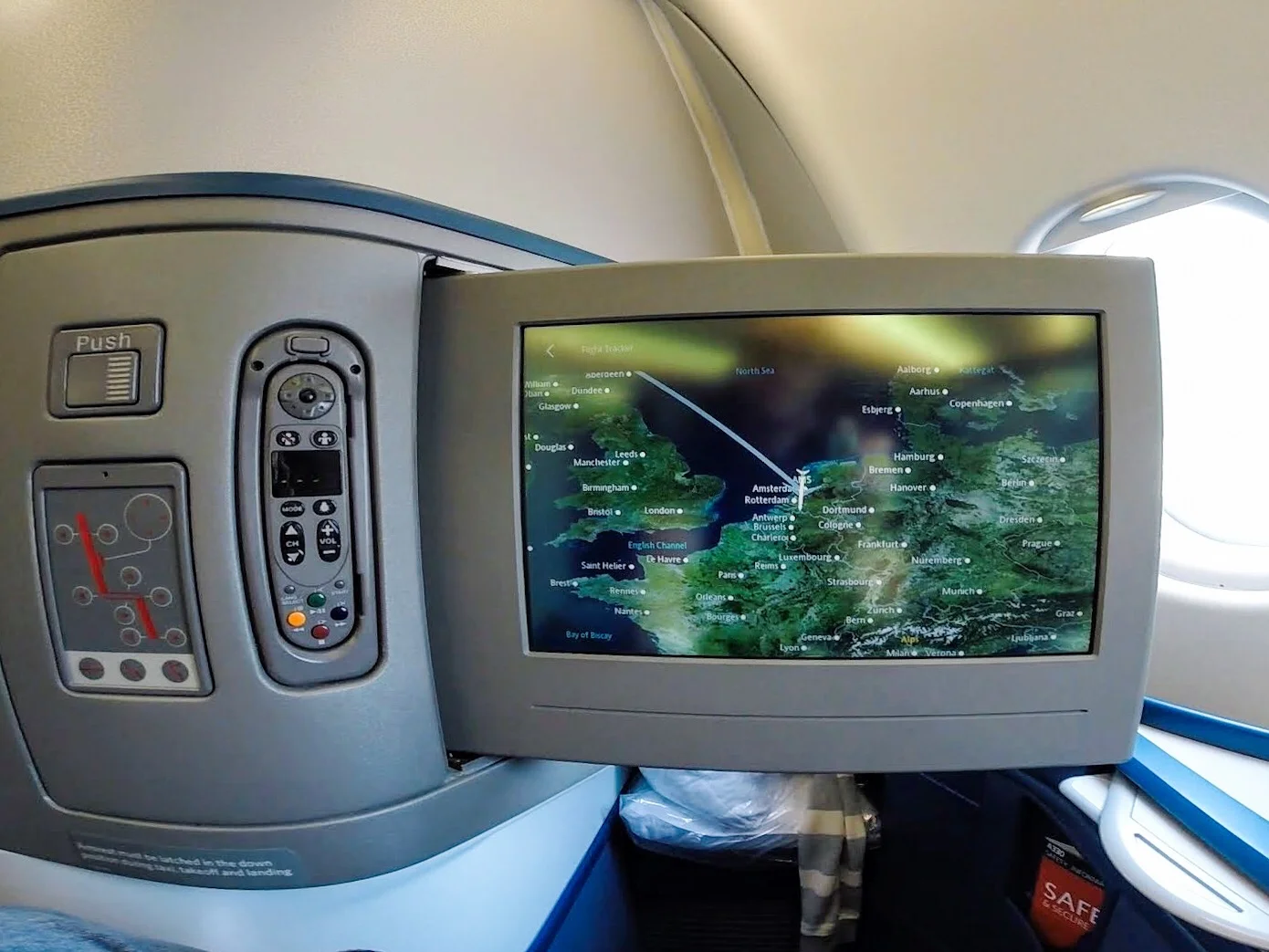 The IFE screen is very large. It is touch-screen, or you can use the handheld remote.