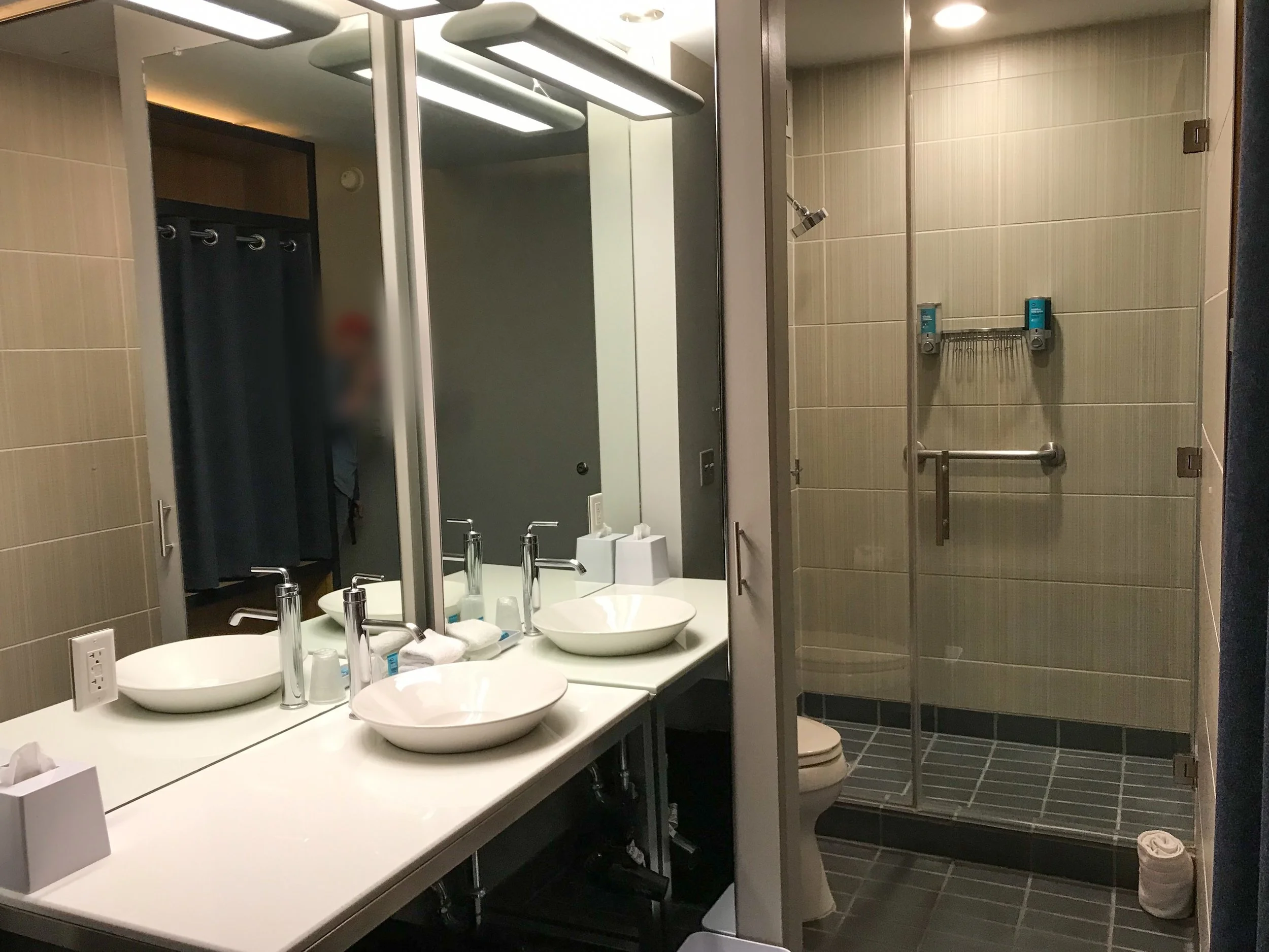 The bathroom only had one sink, but had a large counter.