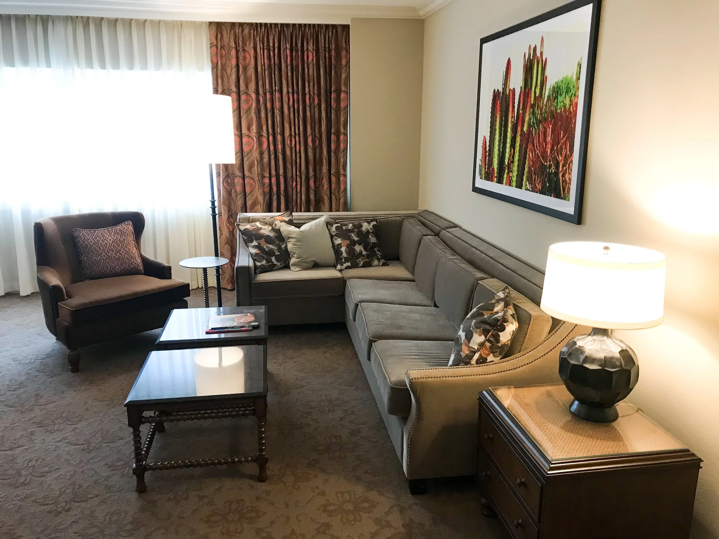 Another view of the sitting area. One small thing I noticed was a lack of accessible power outlets. Both of the lights were plugged in behind the couch and I had nowhere to charge my computer while sitting on the couch.