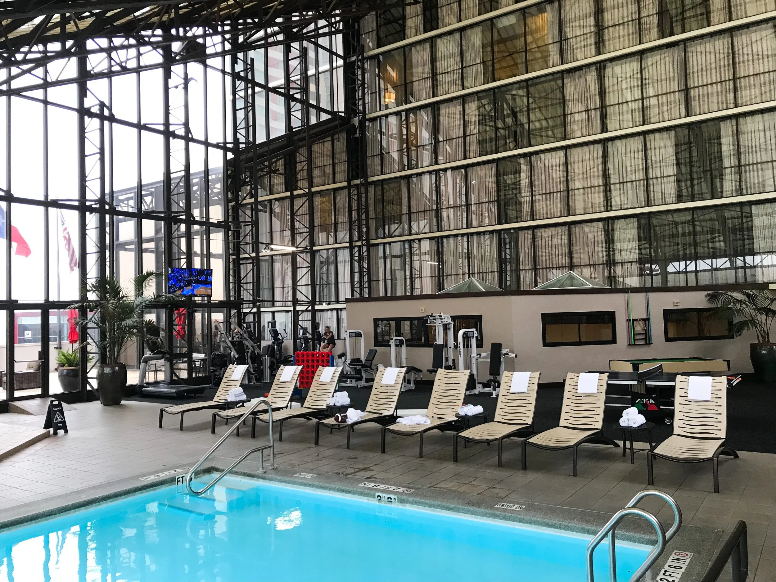 The gym was under renovation, so all of the equipment was in the corner of the pool area.