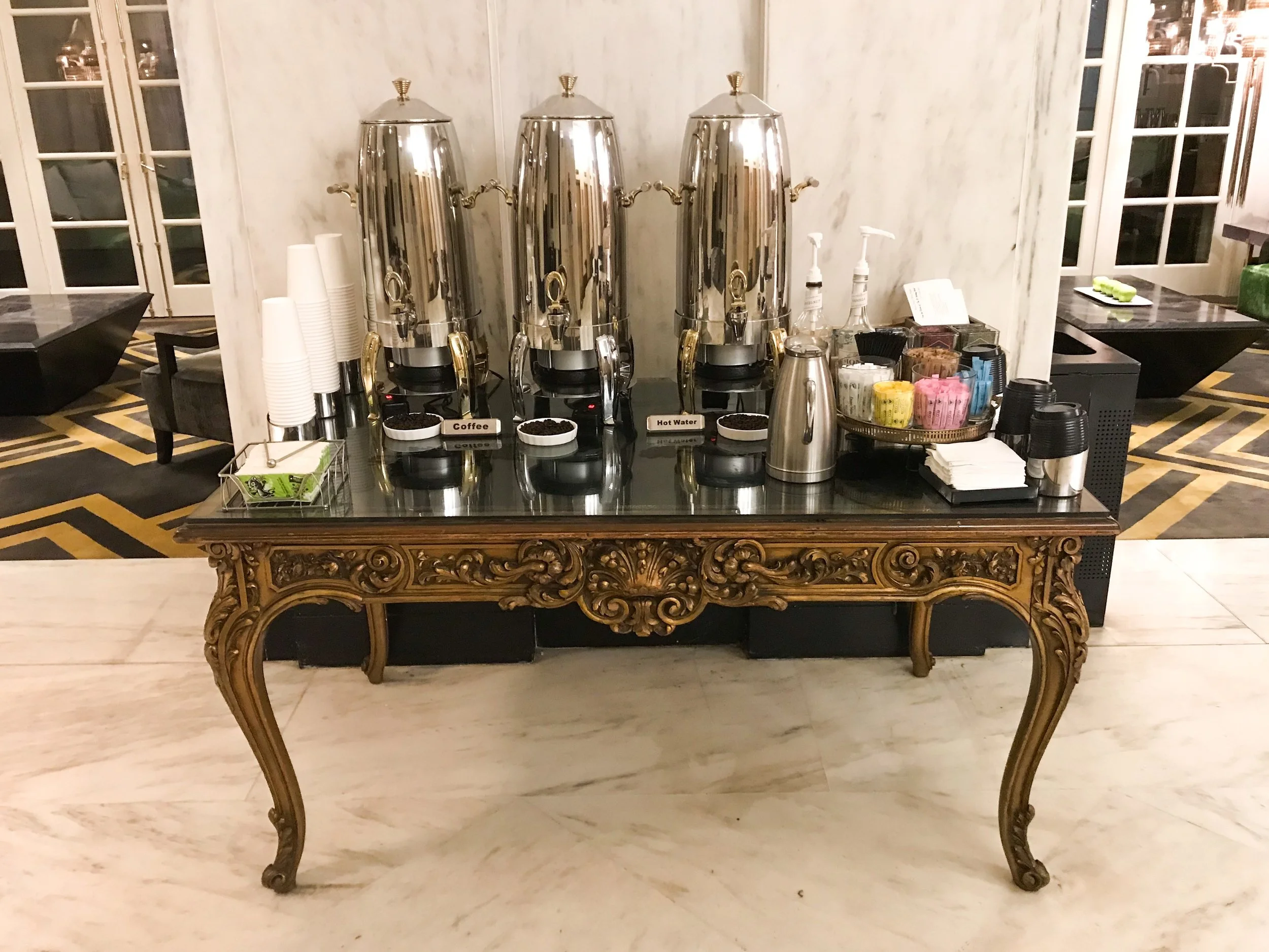 The hotel had complimentary coffee in the lobby. There was no coffee in the rooms.