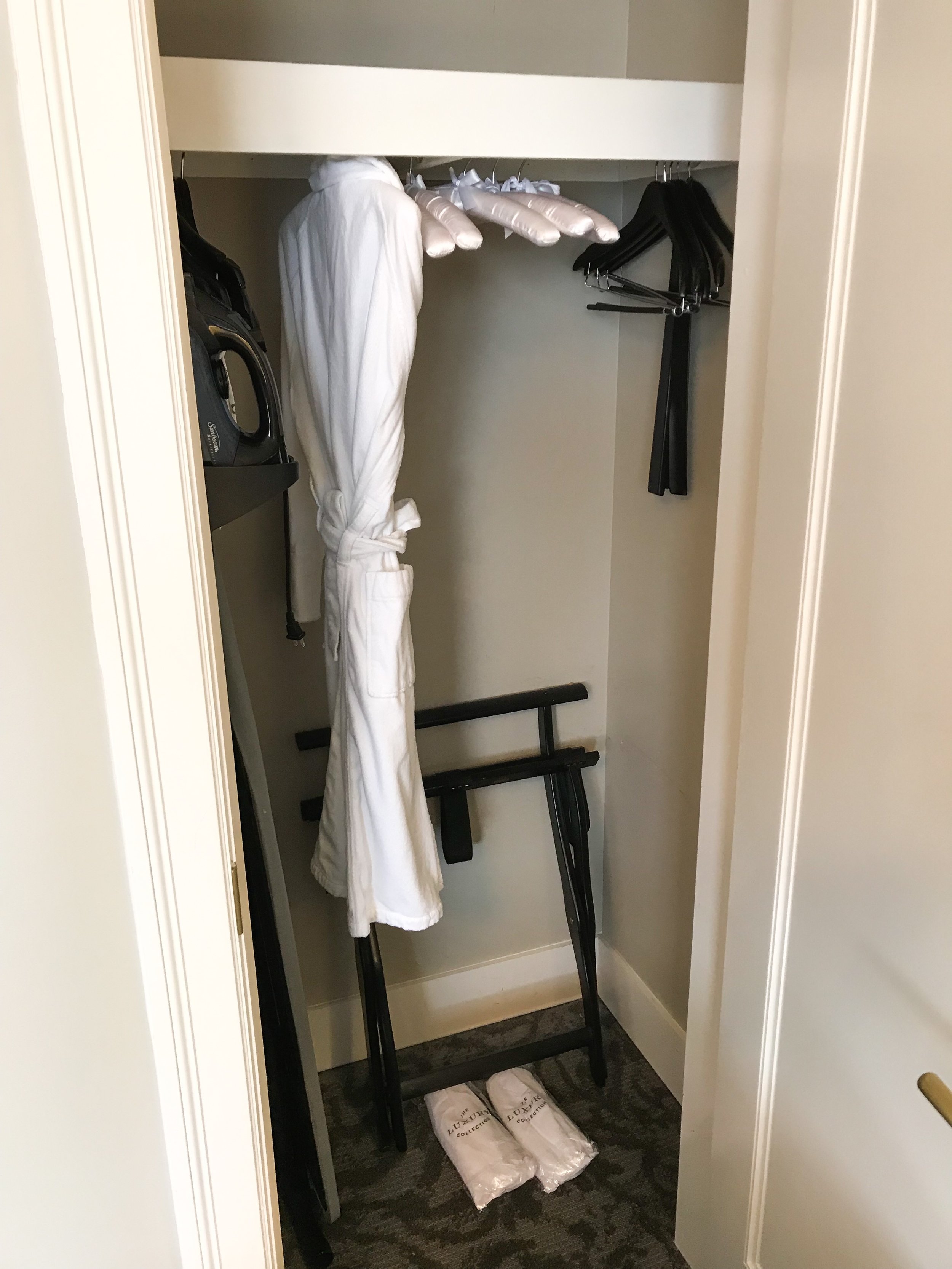 A small closet was located in the corner of the room.