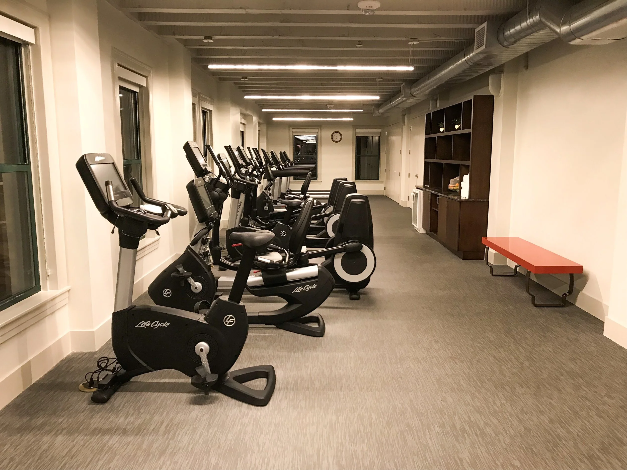 The workout room had several treadmills and stationary bikes, as well as complimentary water and towels.