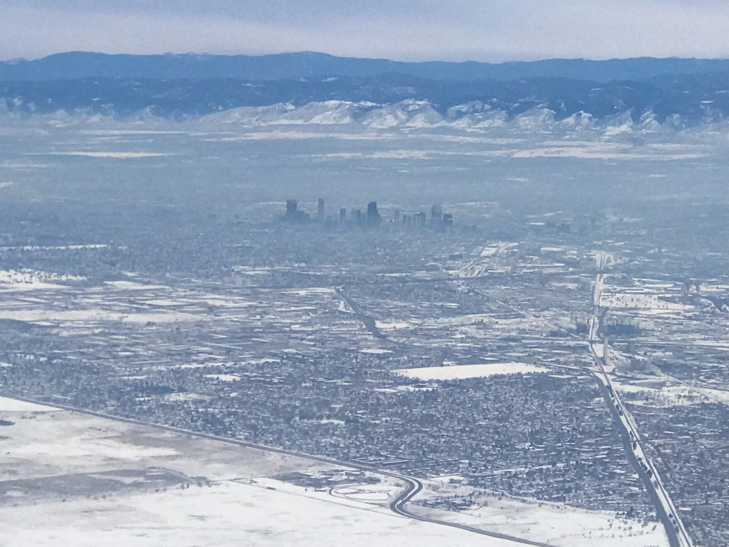 Downtown Denver in the distance as we flew west.