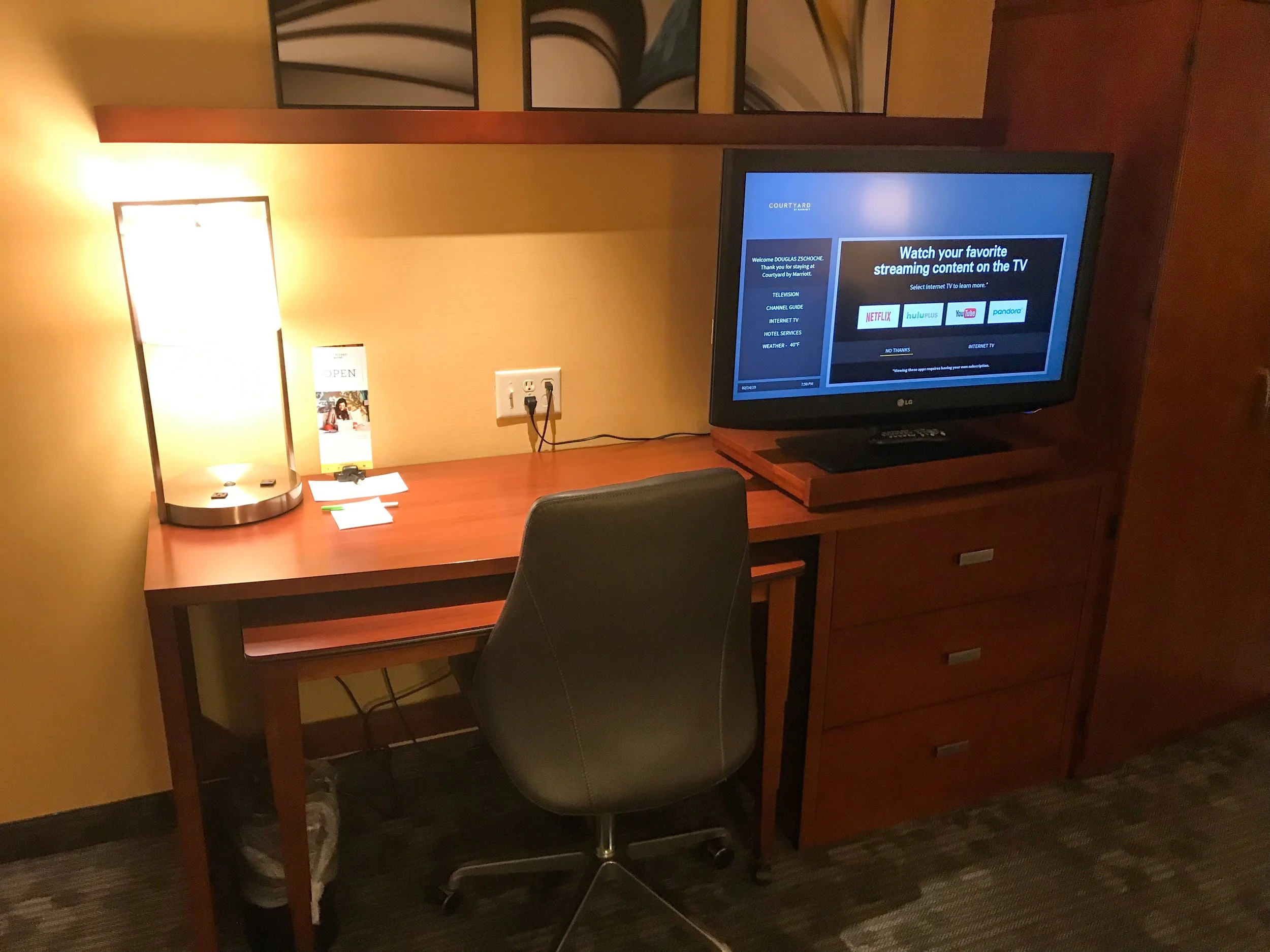 Small desk in the living room area.