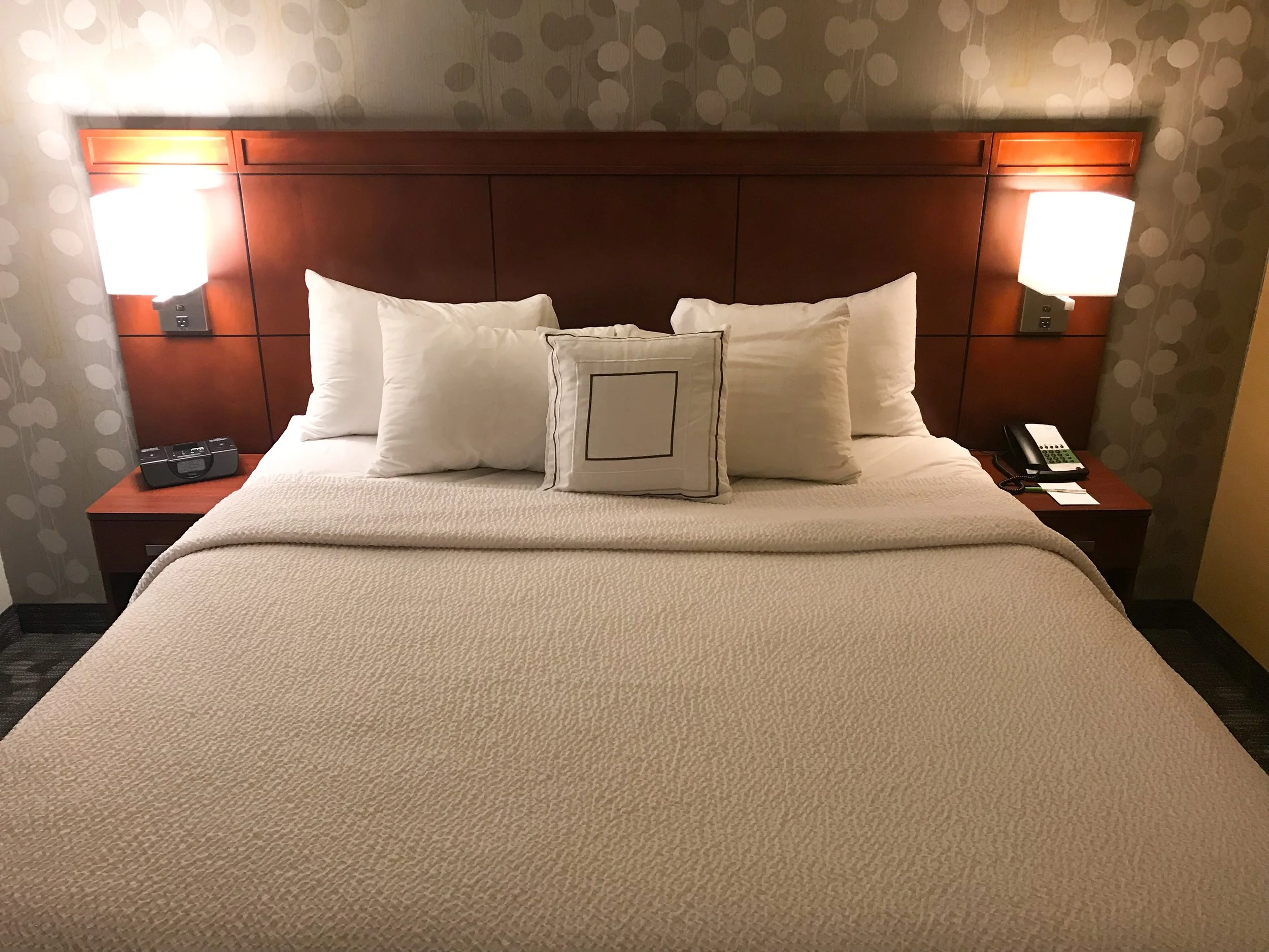 Surprisingly, there were no USB charging ports next to the bed, but there were 110V power outlets on the wall on each side.