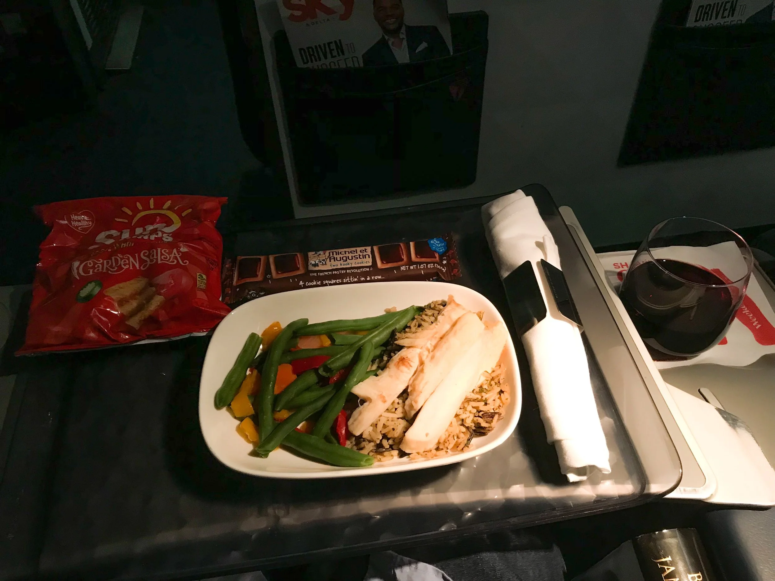 Meals on the ERJ-175 are not as robust as on Mainline Delta flights, due to the smaller galley. There are typically two meal options - sometimes offered from the front of the cabin to the back, and sometimes opposite. There is really no way of predicting where they will start, so be prepared to only have one choice if you’re in Row 1 and they start in the back.