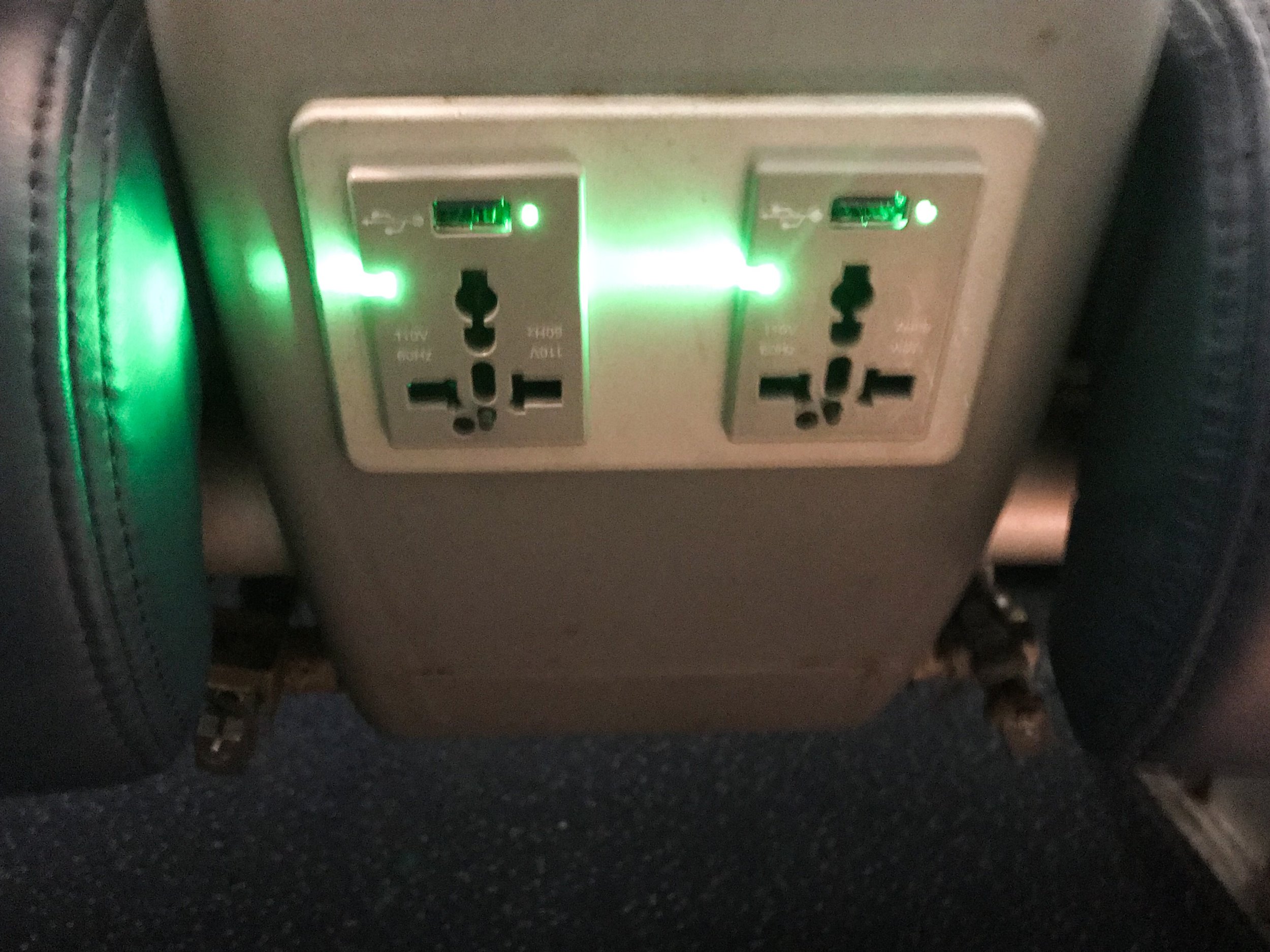 Each seat has a 110V universal power outlet and USB charging port under the front.