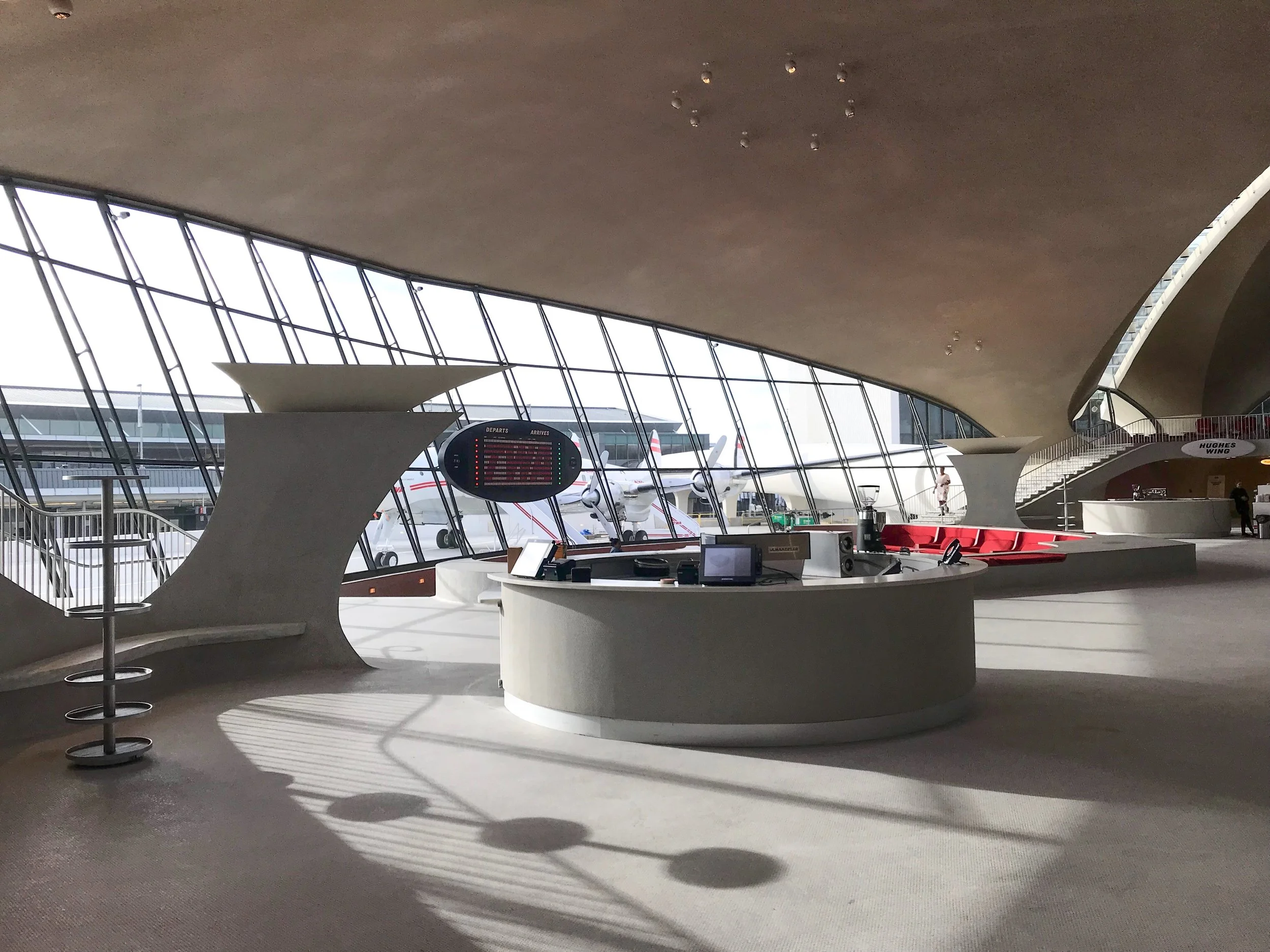 The bridge leads into the hotel lobby, which was once the departures hall.