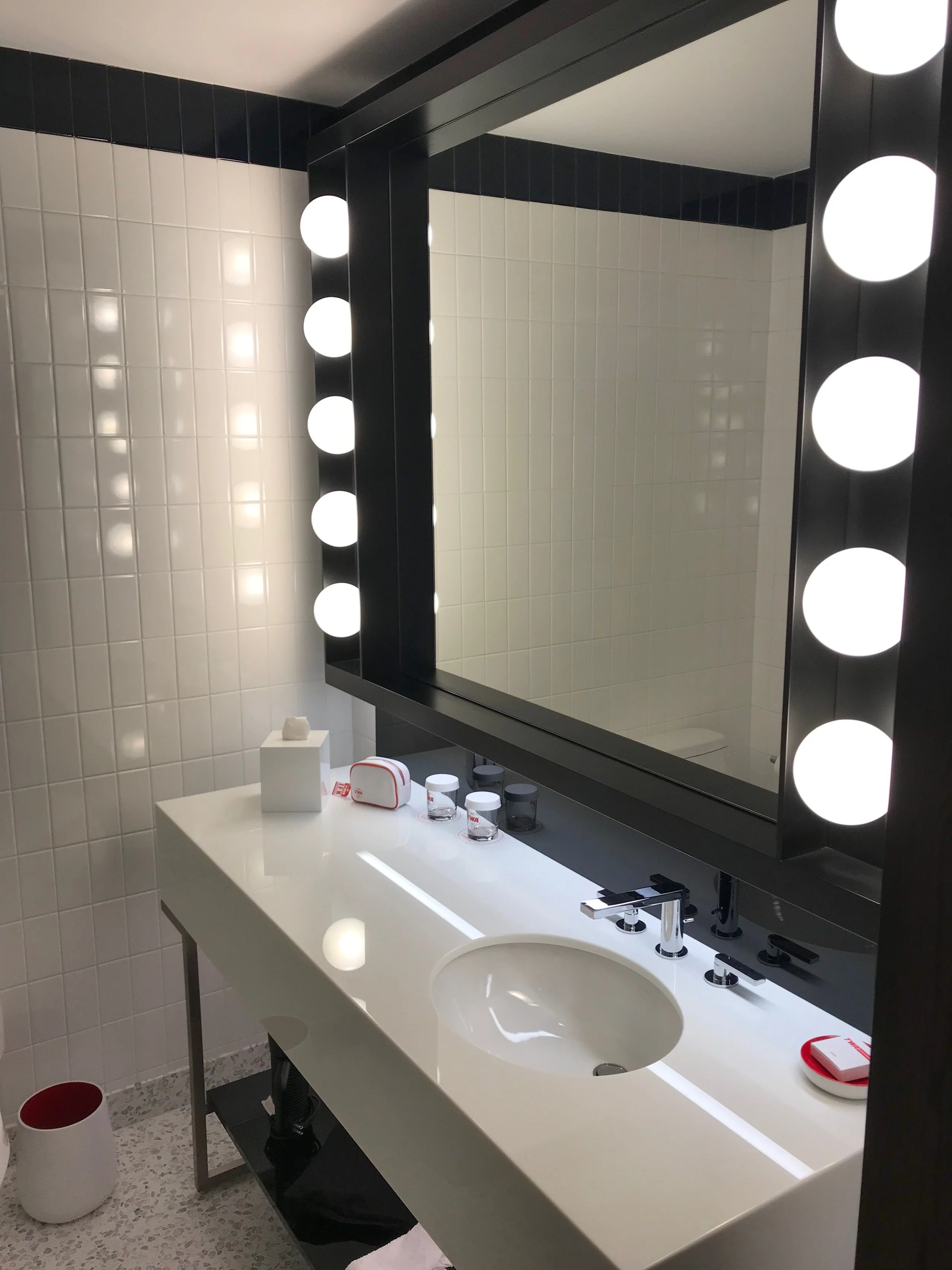 The bathroom has a single sink, but ample counter space.