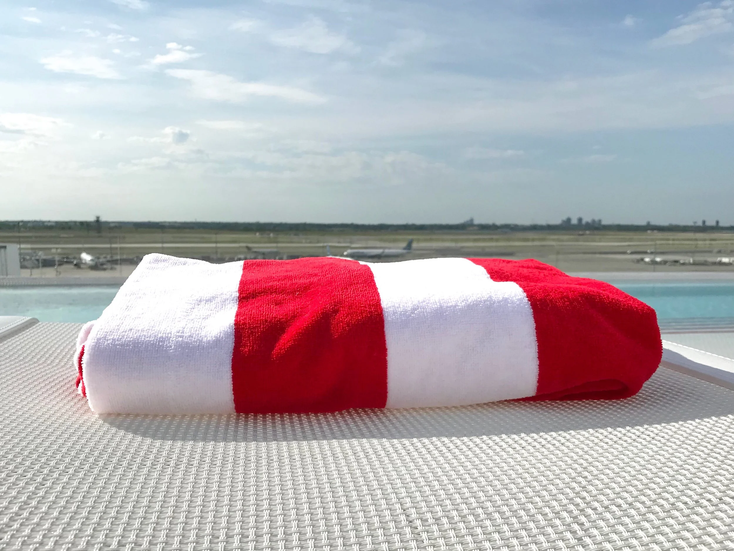 The pool towels match the rest of the decor.