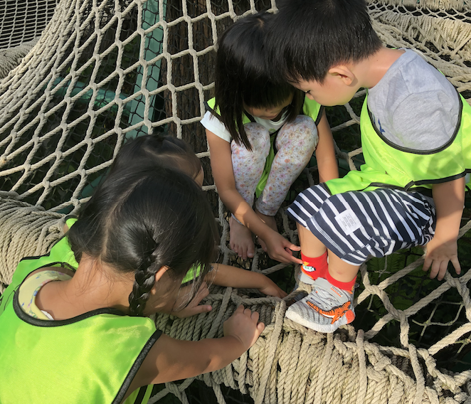 Helping a friend whose shoes were stuck in the net.