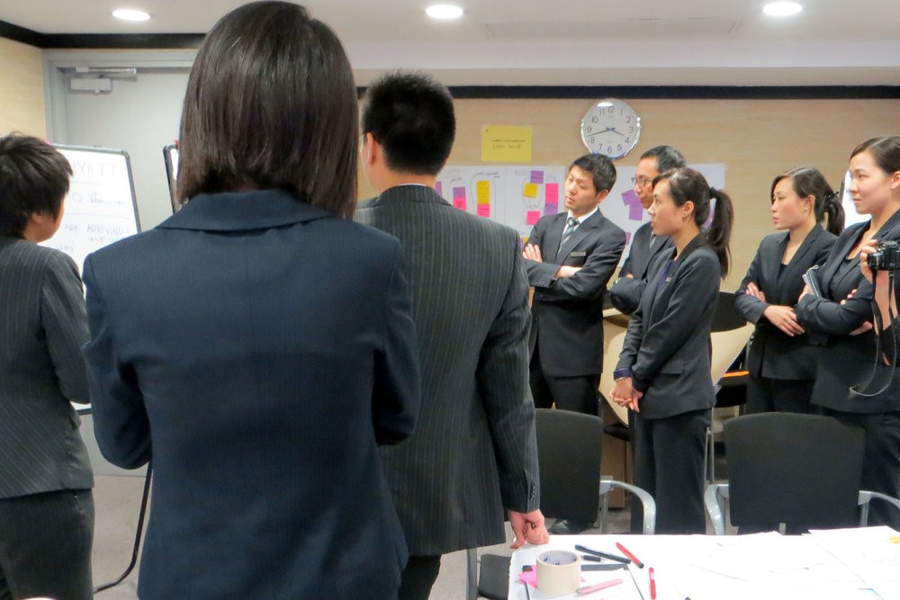 Hyatt engaged hotel staff became an integral part of the design process. Pictured is a team selected for "Lab Hotel" innovation training in Hong Kong during its fourth iteration of the education modules