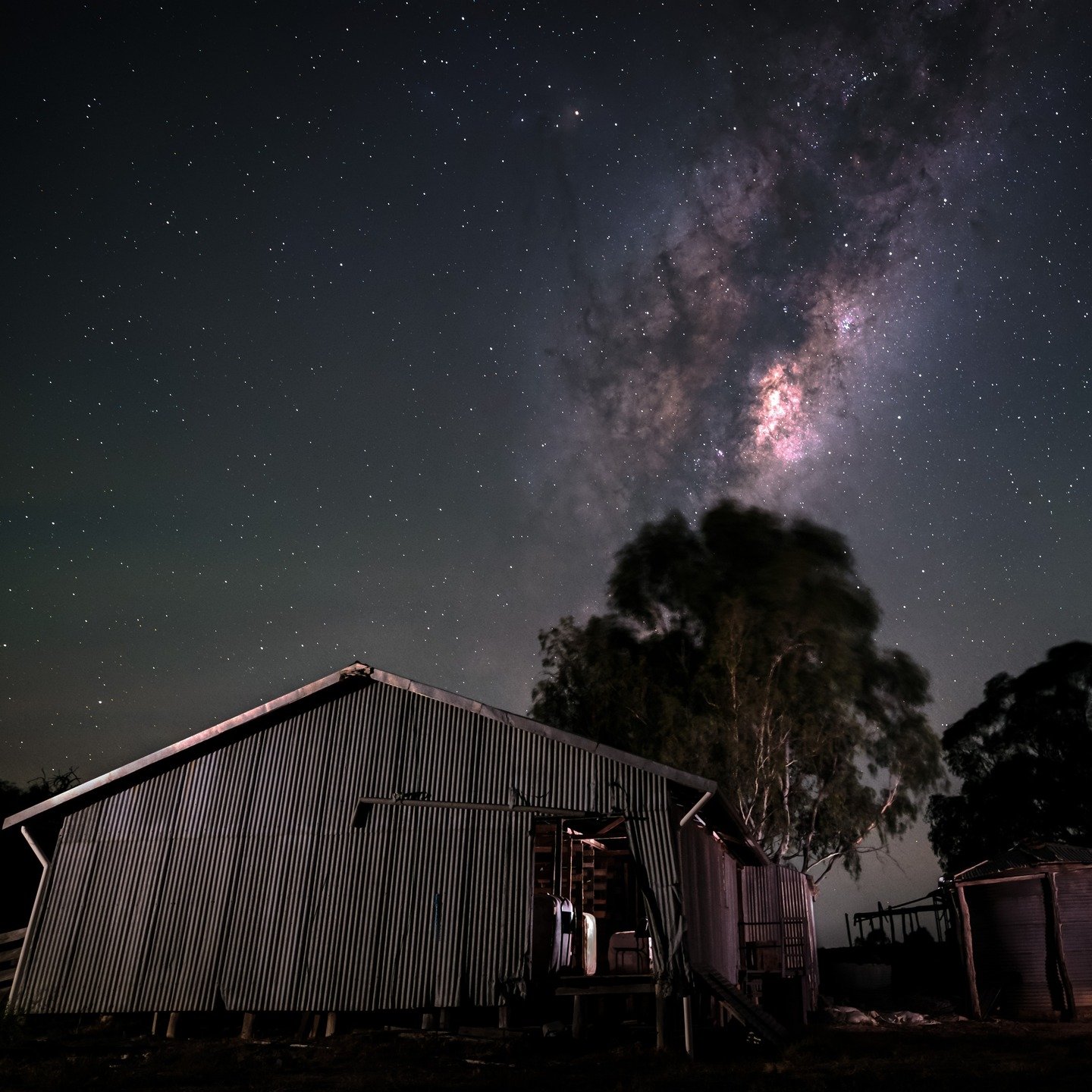 The Milky Way rising over an old (still functioning) shearing shed.

Night sky: Multiple 15sec F2.2 ISO 3200 exposures stacked. 
Shed &amp; foreground: 2 x images lightpainted. 10 sec F5.6

Another image at workshop run by @nightscapeimages 

Fujifil