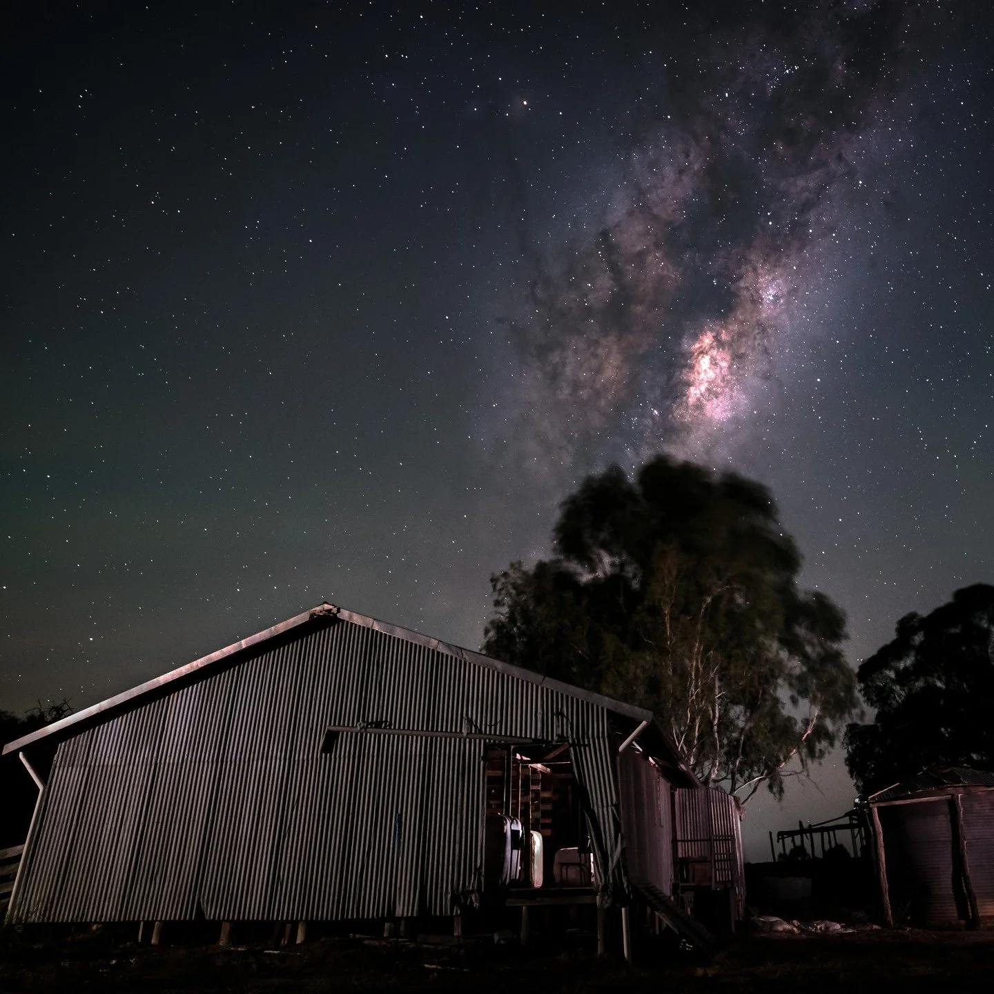 The Milky Way rising over an old (still functioning) shearing shed.

Night sky: Multiple 15sec F2.2 ISO 3200 exposures stacked. 
Shed &amp; foreground: 2 x images lightpainted. 10 sec F5.6

Another image at workshop run by @nightscapeimages 

Fujifil
