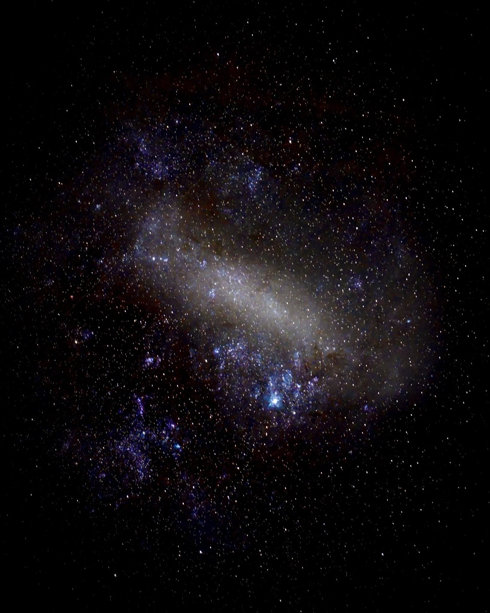 Large Magellenic Cloud, 

Not to best of nights to go out shooting astro last night as the moon was already up and bright and there was some cloud cover but I manage to get this shot of the Large Magellenic Cloud last night.  One of my first successf