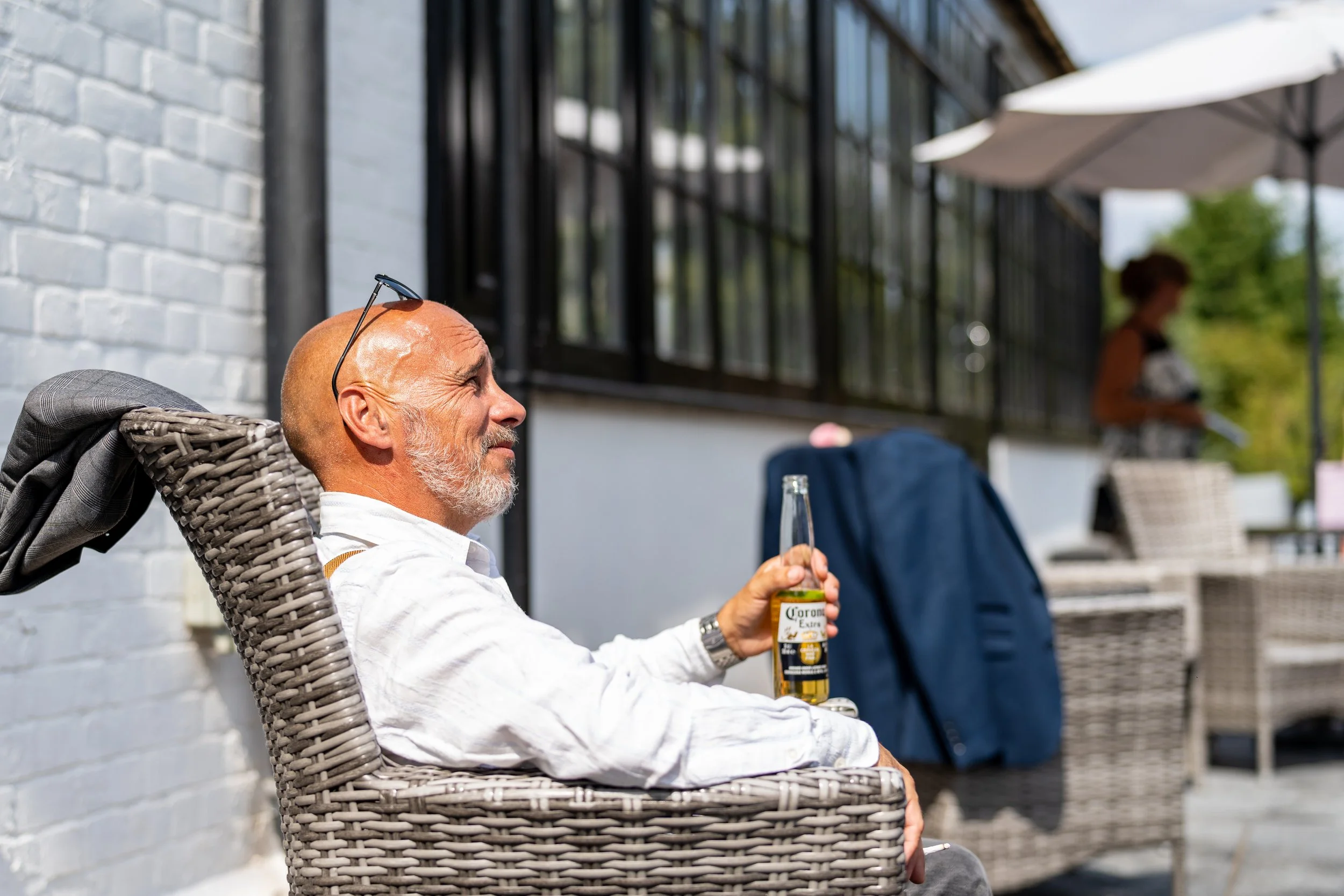 Wedding guest captured relaxing and smiling in a candid moment