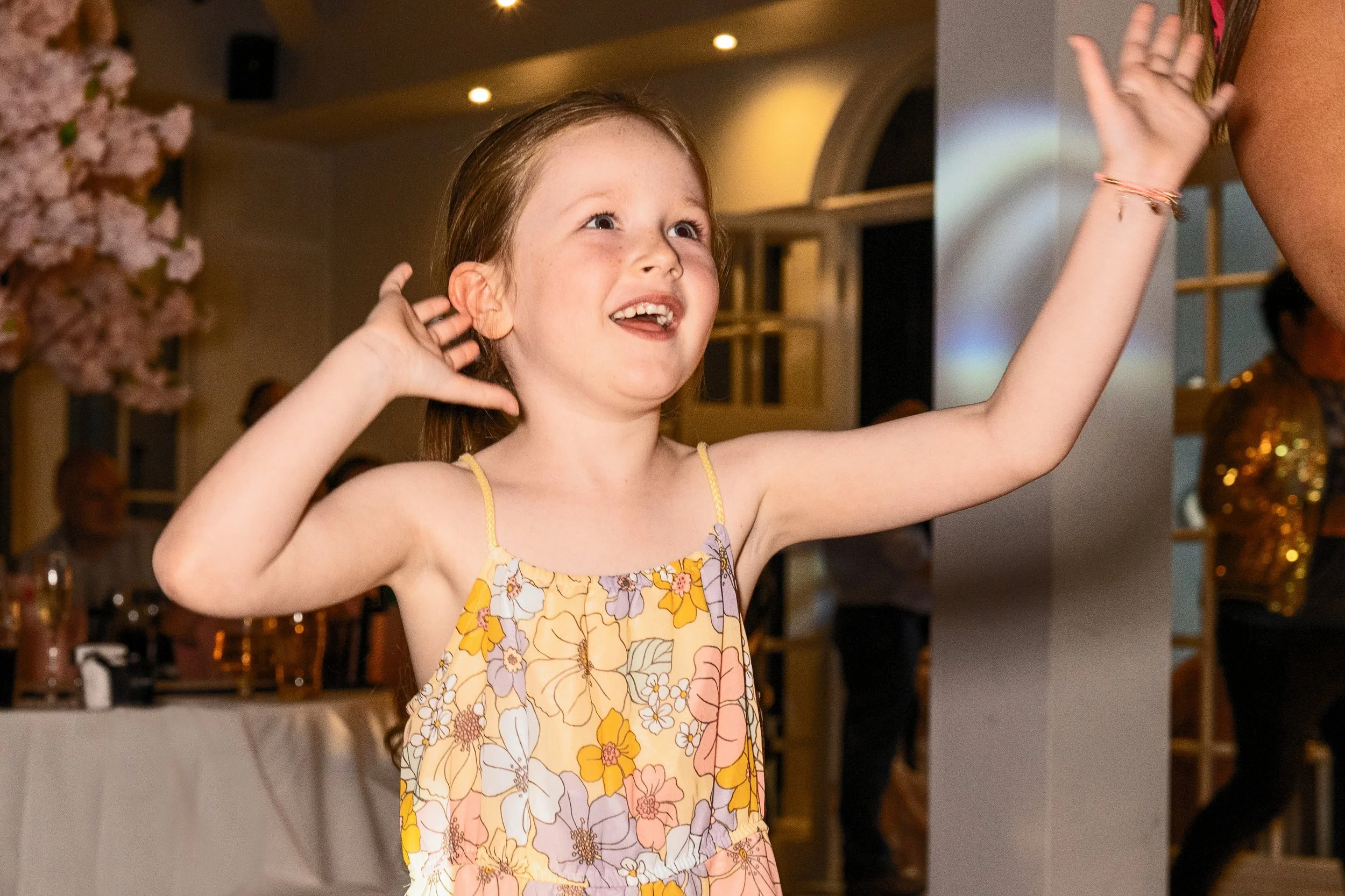 Child dancing at a wedding