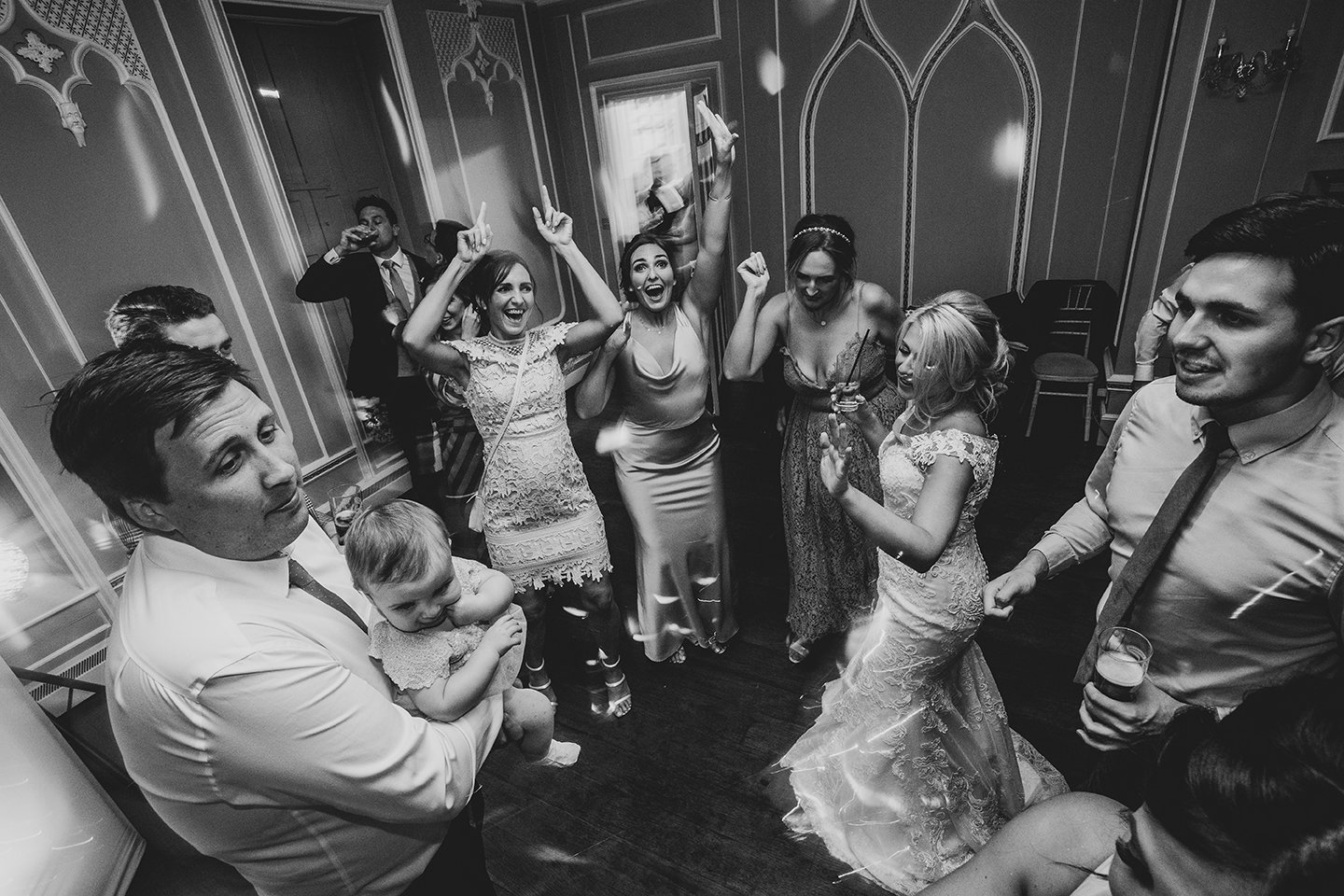 Wedding guests photographed in a candid documentary style 