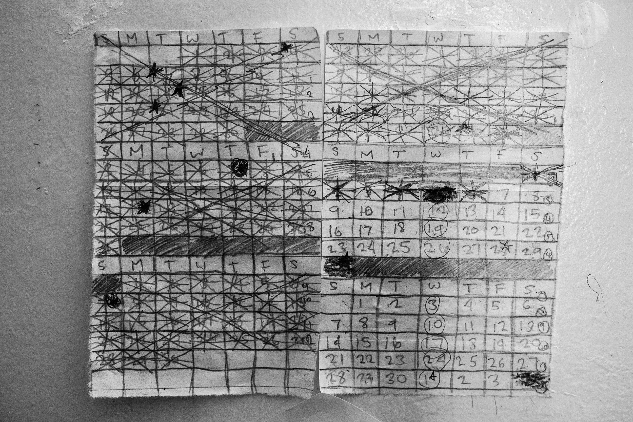  A hand made calendar hangs on the wall of Shanon's cell at the Glen Dyer detention facility counting the days he is imprisoned. 