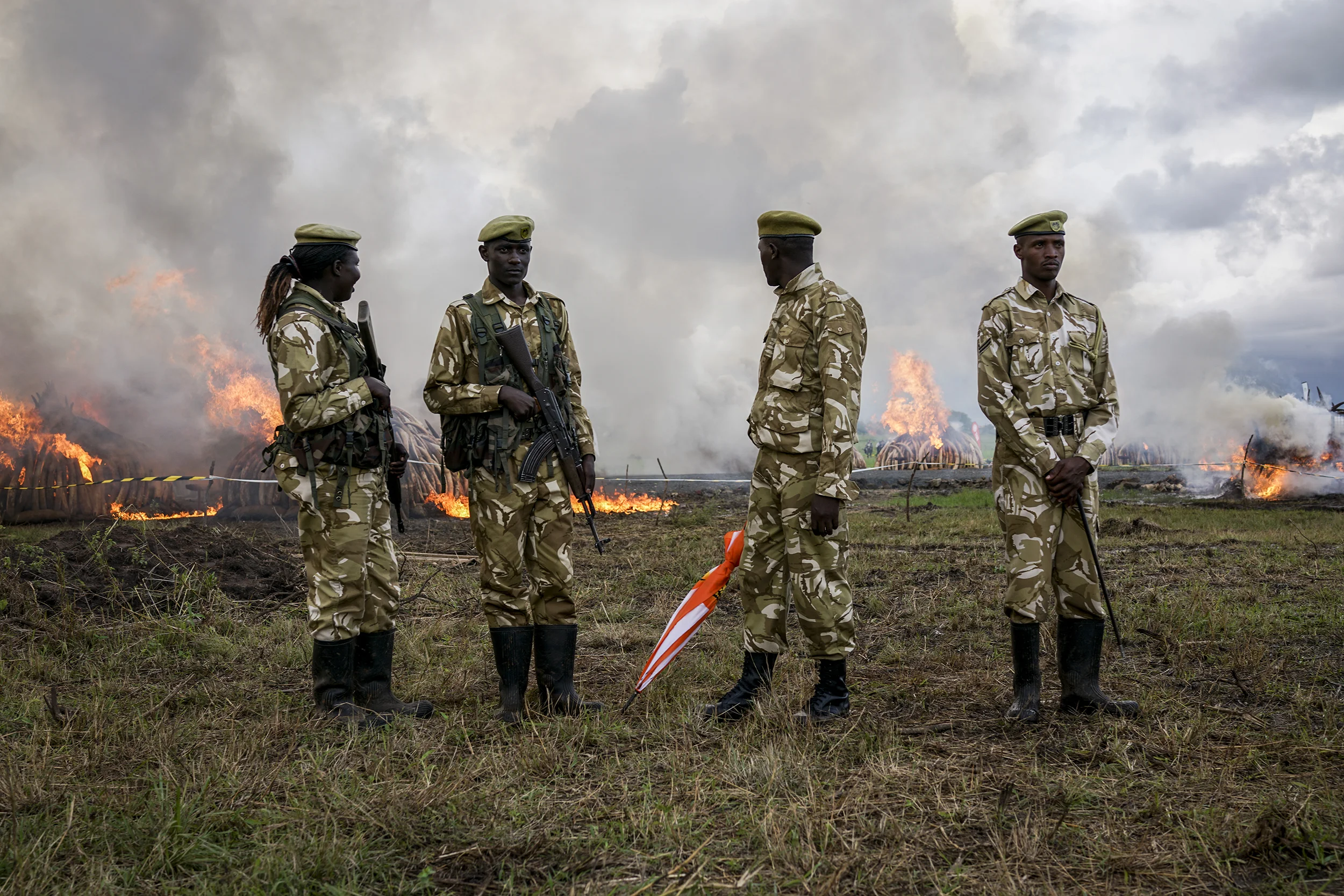 Wildlife Services rangers stand guard near the Ivory burning site in Nairobi Kenya on April 30th 2016. More than 100 tonnes of ivory were burnt to promote protecting endangered elephants.