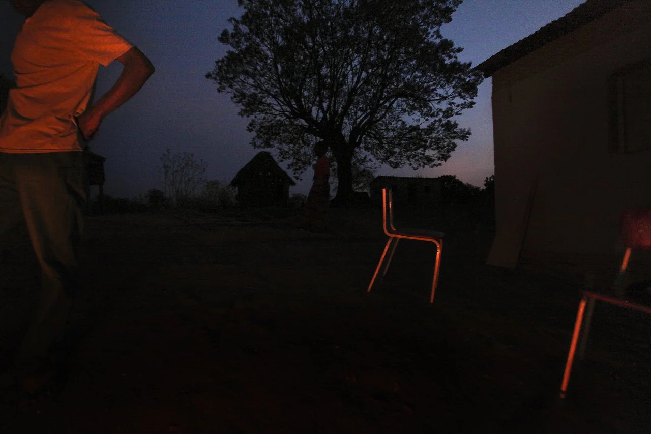  People make fire at night in a village, located in the region of Bakita in Zimbabwe. The village is about a 40 minute hike from the closest shops. Thousands of Zimbabwean refugees crossed the border to South Africa to escape political turmoil, lack 