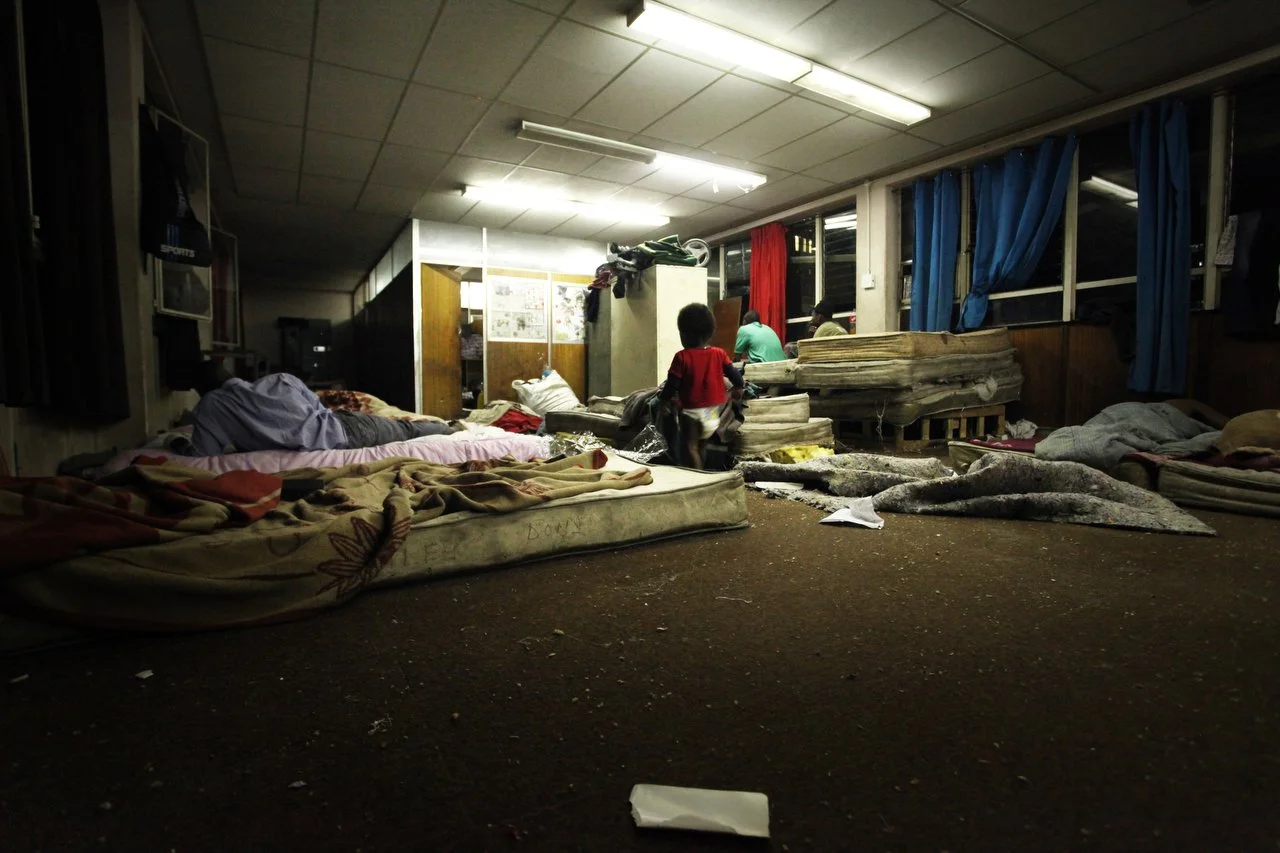  The third floor of the the Central Methodist Church in Johannesburg South Africa at night. The church has an official capacity of 1,500 people. At night, more than 2,000 patrons occupy every floor space available. The church has been a sanctuary for