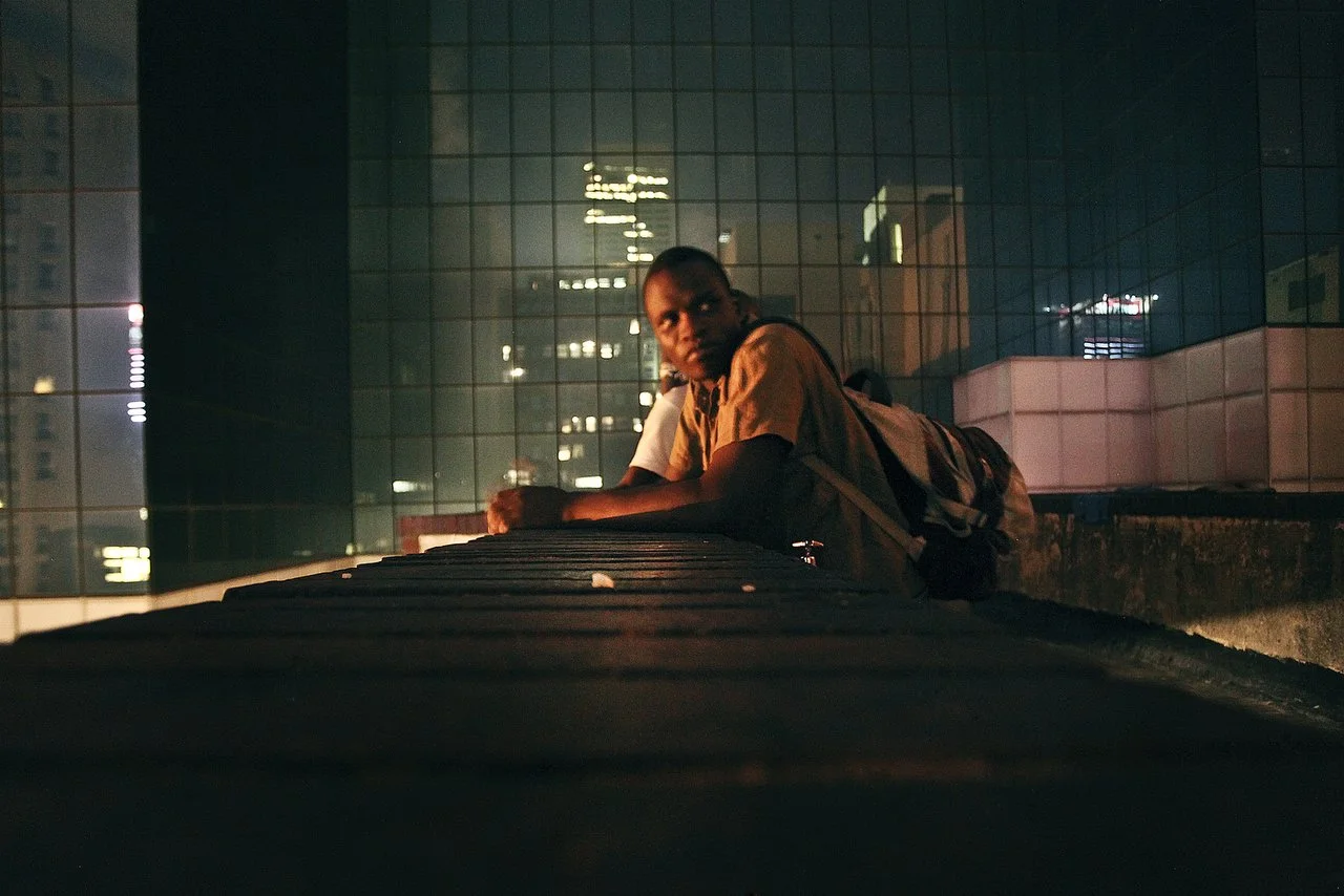  Reymond Mapakata on the roof of the Central Methodist Church in Johannesburg South Africa at night. The church has an official capacity of 1,500 people. At night, more than 2,000 patrons occupy every floor space available. The church has been a sanc