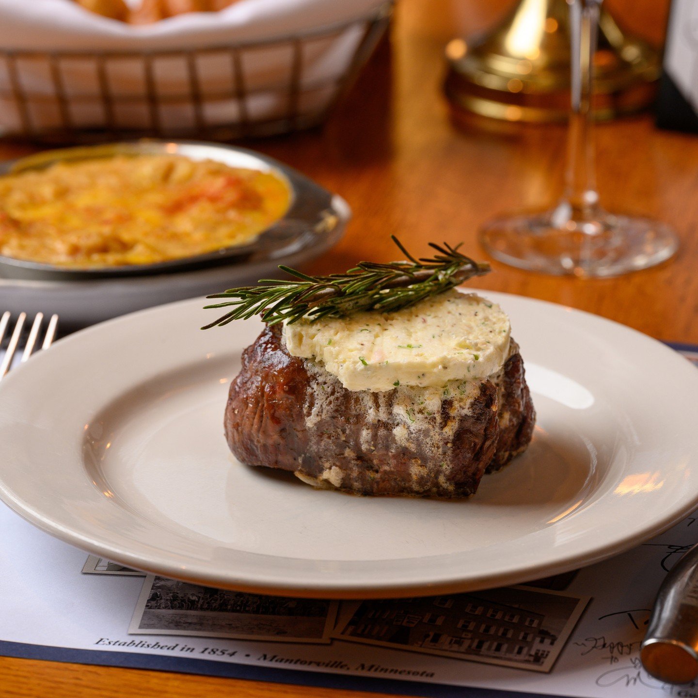 Hubbell House Filet Mignon- 10oz hand cut tenderloin, our most tender cut. Topped with Maitre&rsquo;d butter. Our mouths are watering!