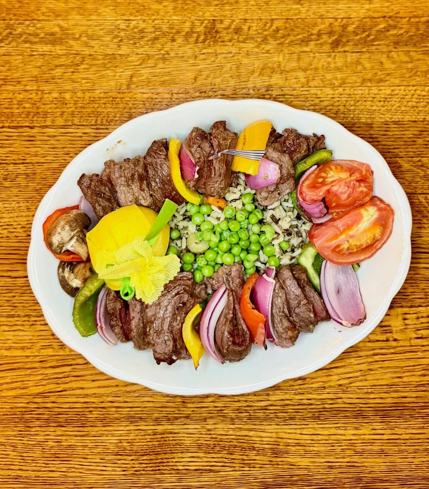 🌟 Beef Shish Kabobs🌟

Greek marinated tenderloin, bell peppers, onions, tomato, and mushrooms over a bed of mixed rice and peas. Served with choice of au gratin, western, French fries, or baked potato. Choice of salad, soup, herring, or coleslaw. G