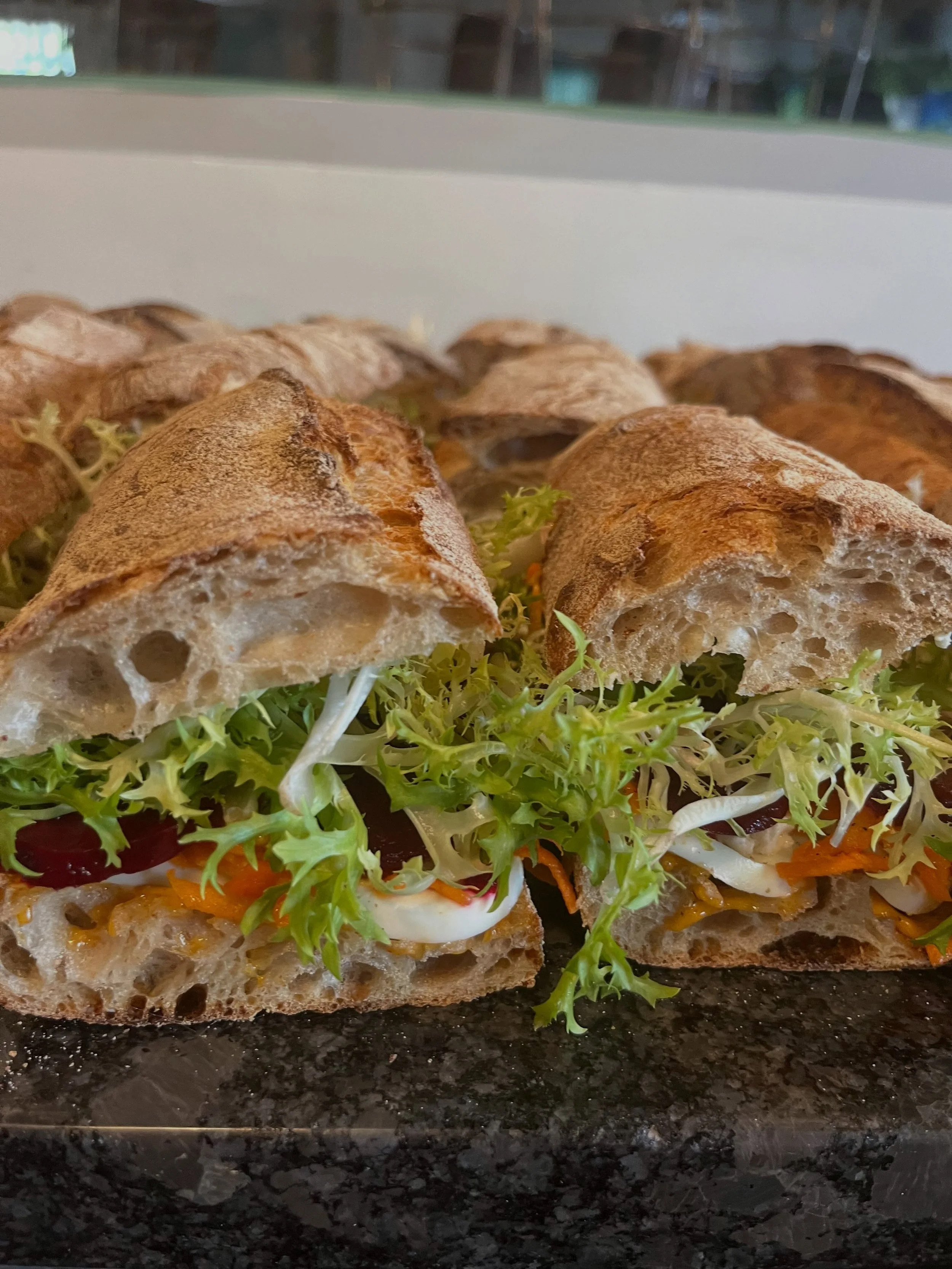 🍞⛪️ NOW till 2pm, and pro tip: no line after 11:30🤷🏻&zwj;♂️

Baguette
Crackle Rye
Barley
Ciabatta

Peach Barley Scone
Raspberry Jam Scone
Cardamom Snail
Marionberry Handpie
Tahini Carrot Cake

Olive Twist
Pretzel
Eggplant Slab
Zucchini Pesto Slab
