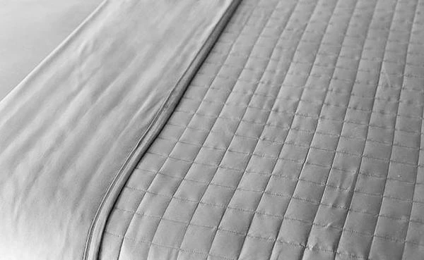 quilted-blanket-dove-grey_grande_ce6f4569-e112-4120-8265-f77c4a5aa2e6_grande.png