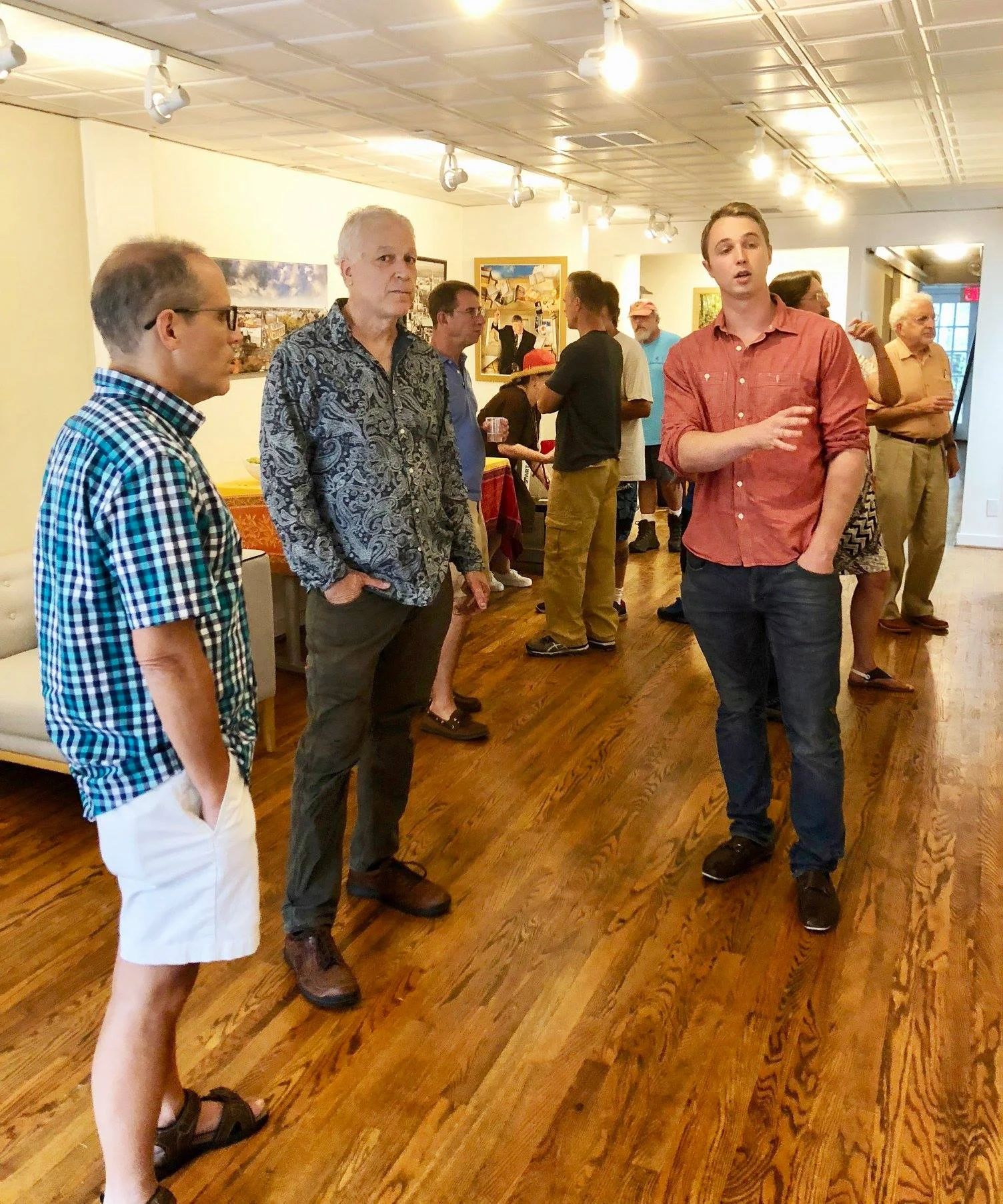 Steven Grodnitsky, Demetrios Fotos and Josh Tongue conversing about the new image of Maryland Avenue.