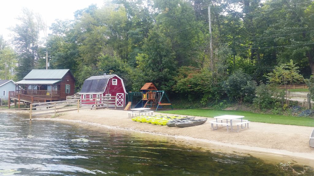 Sandy gentle-slope private beach is 80 ft long has tables; kayak racks coming!