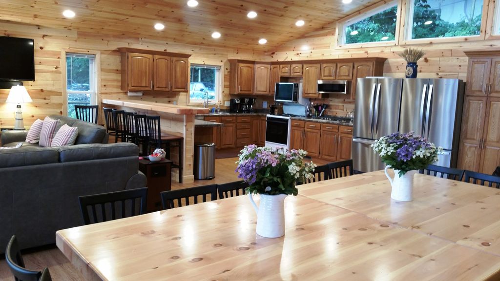 Kitchen has 2 fridges, 2 gas cooktops, 2 ovens, 2 dishwashers, microwave.