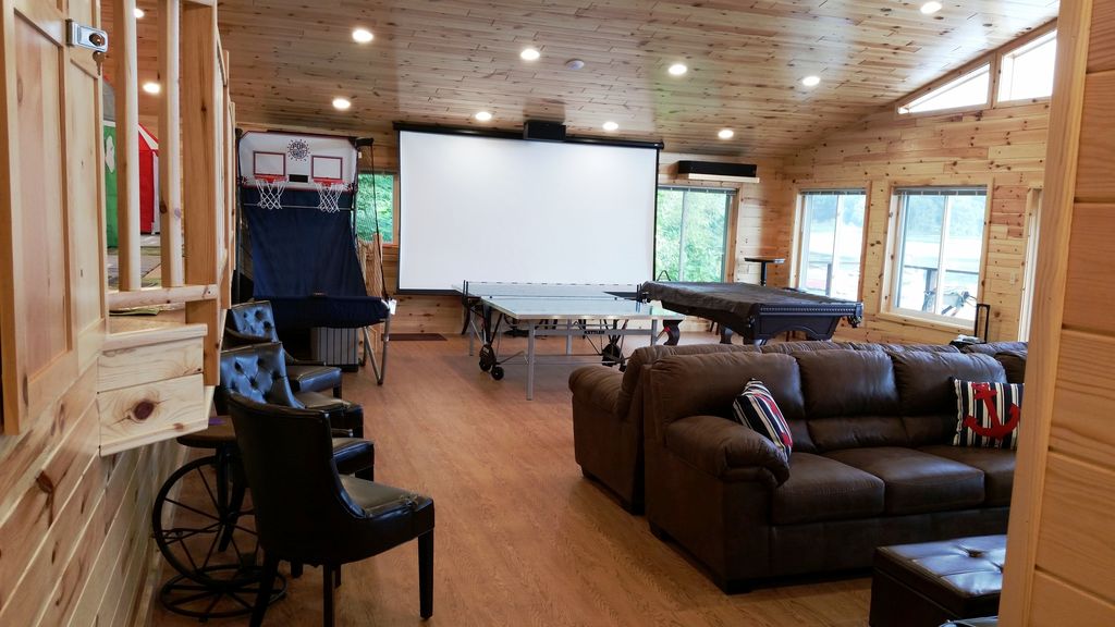 12-foot HD projector TV screen, Klipsch Surround Sound...great audio-video!